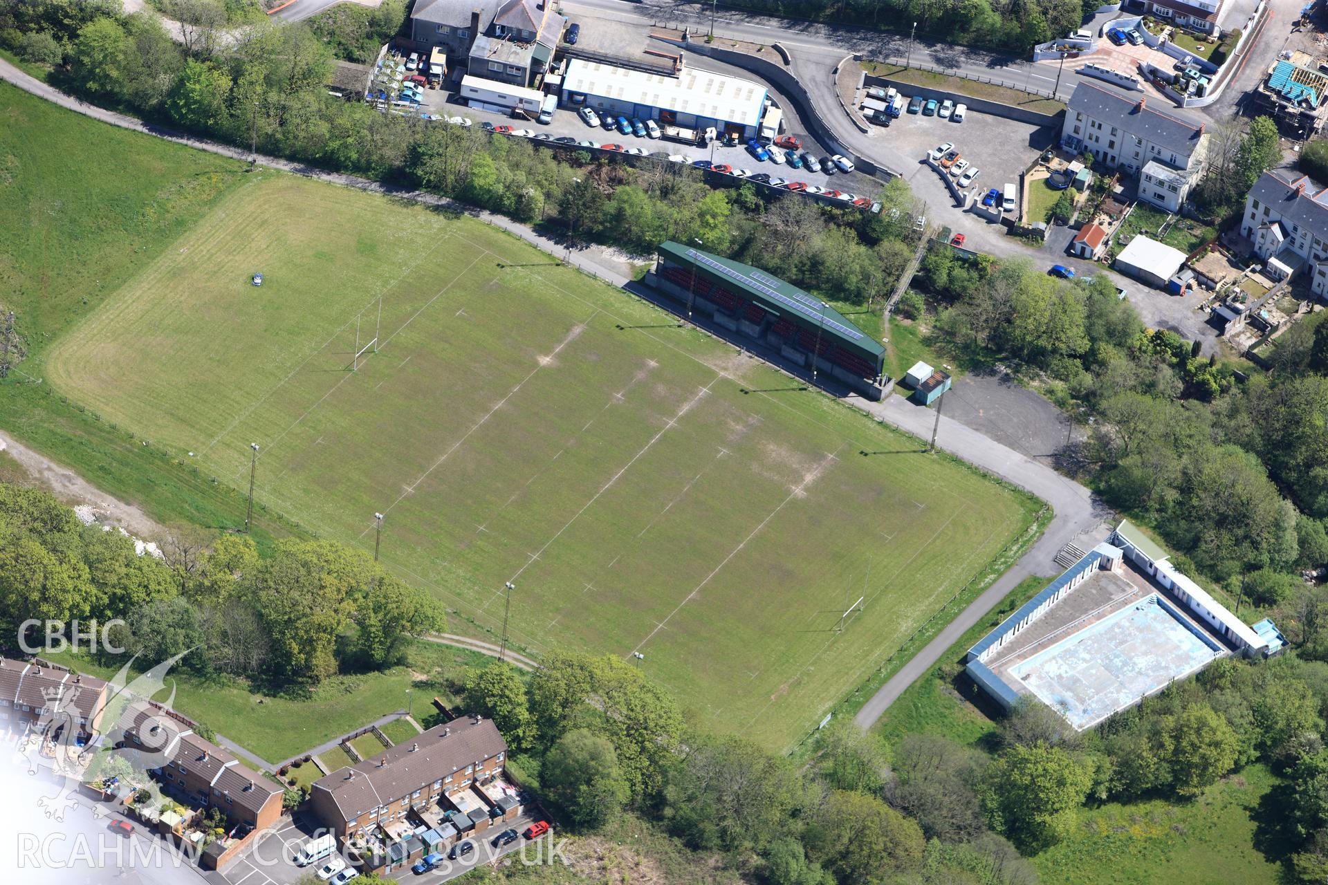 RCAHMW colour oblique photograph of Brynamman, open air swimming baths, and rugby pitch. Taken by Toby Driver on 22/05/2012.