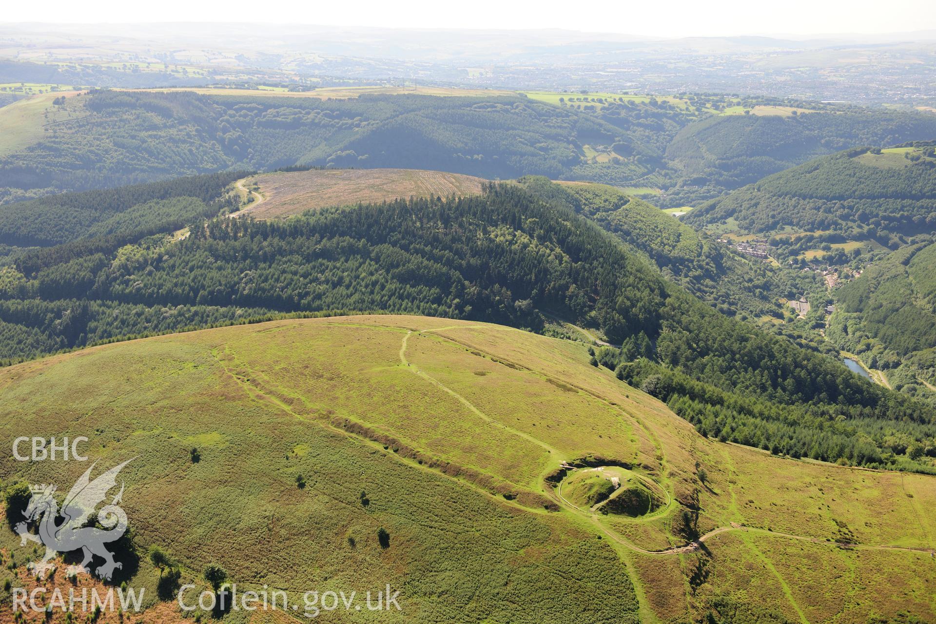 RCAHMW colour oblique photograph of Twmbarlwm, Castle and hillfort. Taken by Toby Driver on 24/07/2012.