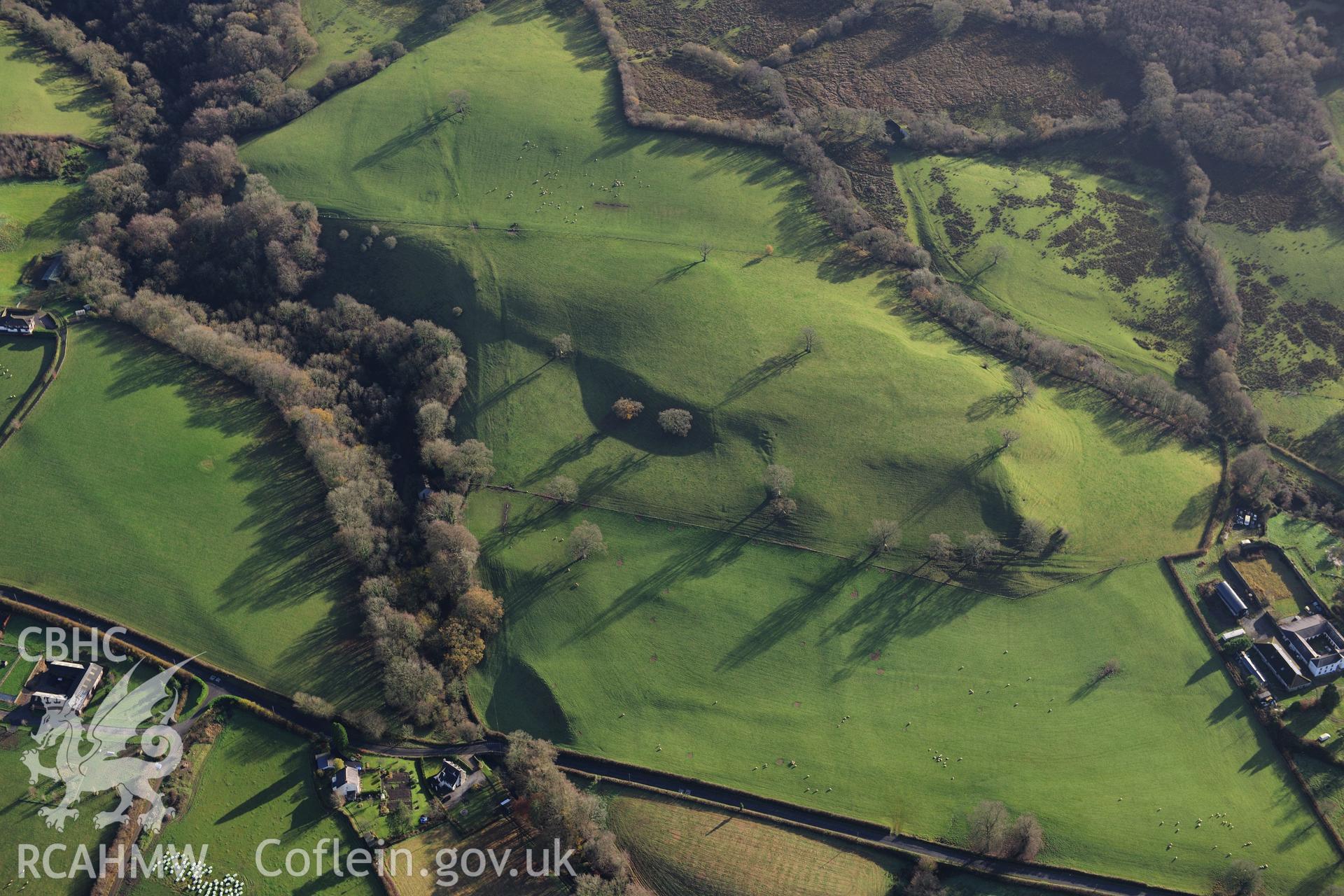 RCAHMW colour oblique photograph of Manorafan, earthworks of early field system in parkland. Taken by Toby Driver on 23/11/2012.