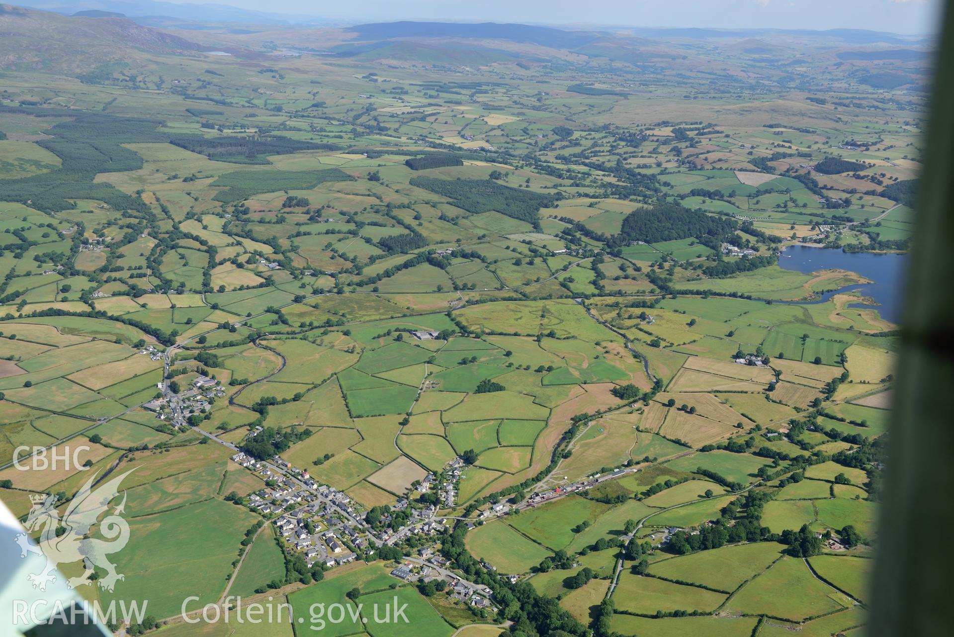 Royal Commission aerial photography of Bala Lake Railway, with non-archaeological parchmarks of a camping ground nearby, taken on 19th July 2018 during the 2018 drought.