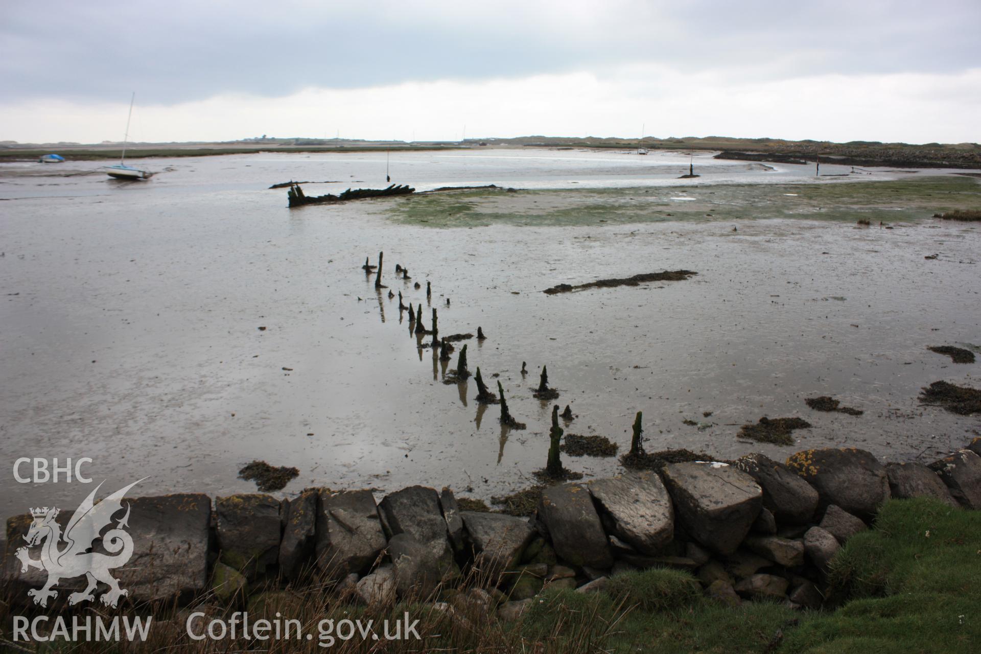 Remains of small timber jetty to the northeast of wreck (view from embankment looking towards Shell Island)