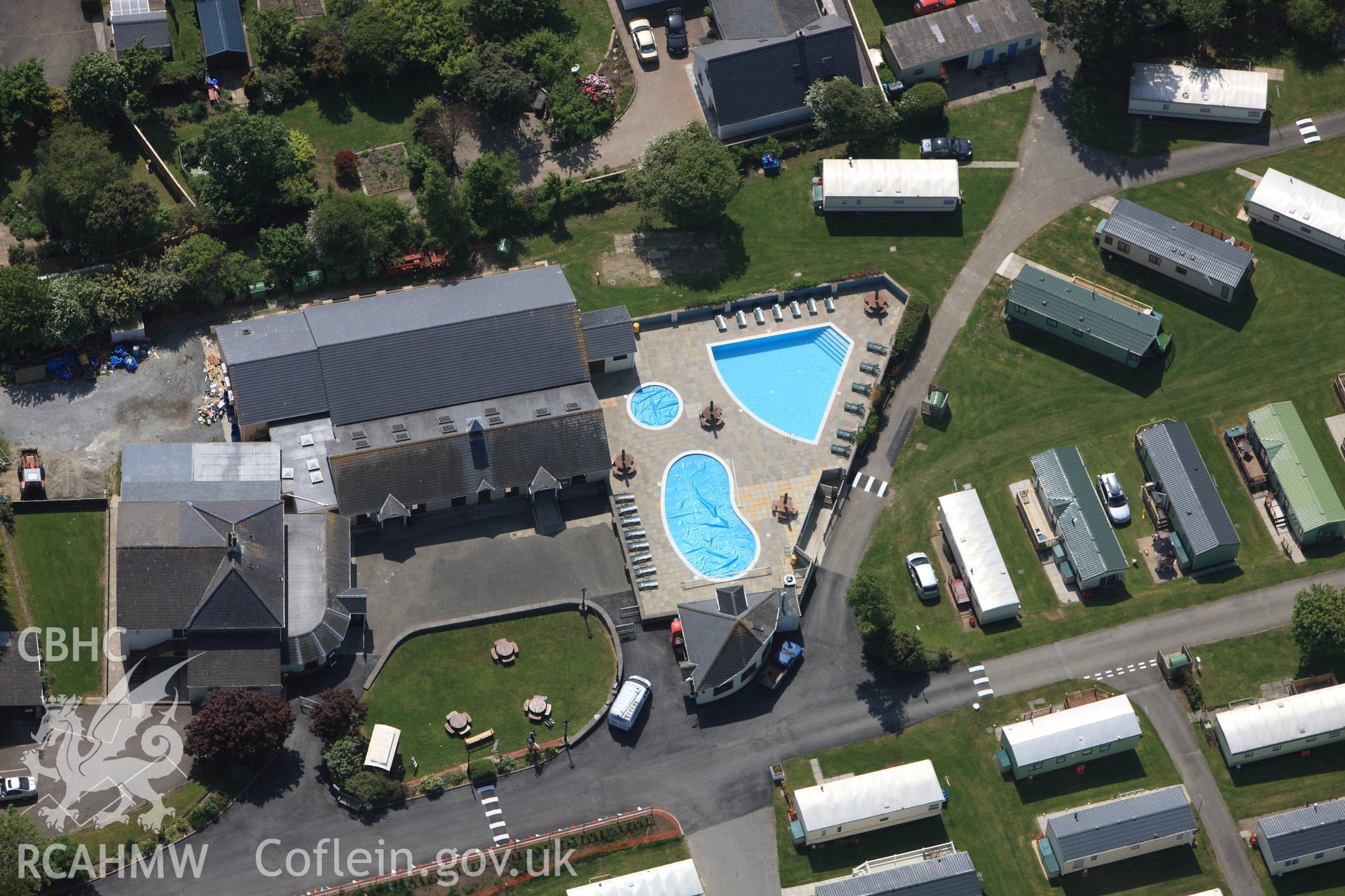 RCAHMW colour oblique photograph of Aeron coast caravan park. Taken by Toby Driver on 25/05/2010.