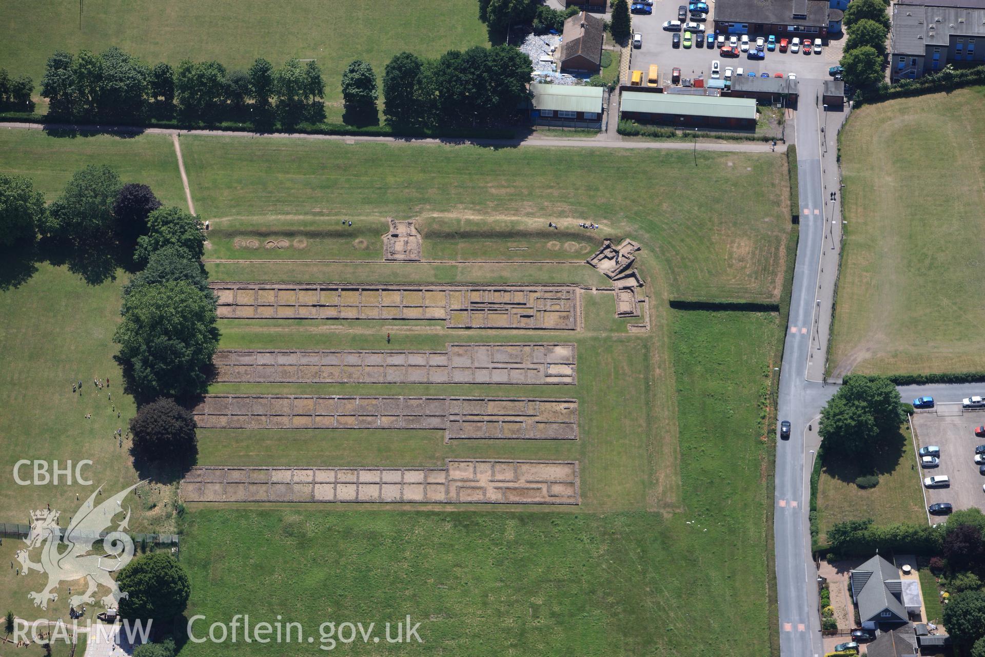 RCAHMW colour oblique photograph of Roman Barracks, Prysg fields, Caerleon. Taken by Toby Driver on 21/06/2010.