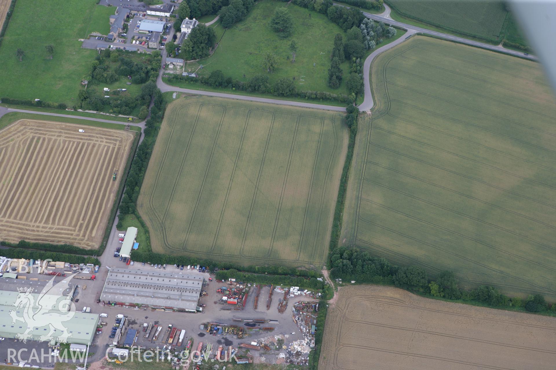 RCAHMW colour oblique photograph of Llancayo Farm Cropmark Enclosures. Taken by Toby Driver on 29/07/2010.