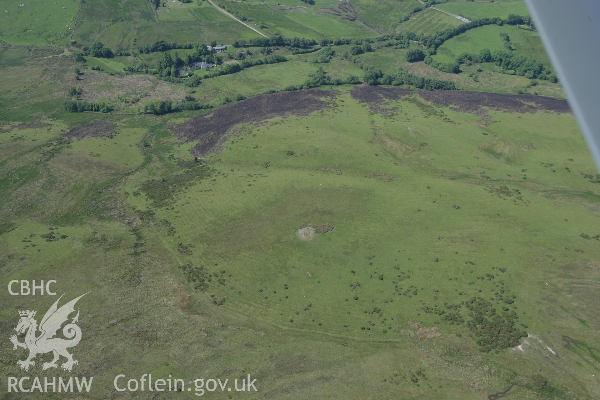RCAHMW colour oblique photograph of Pen Cad Cymry Cairn. Taken by Toby Driver on 16/06/2010.