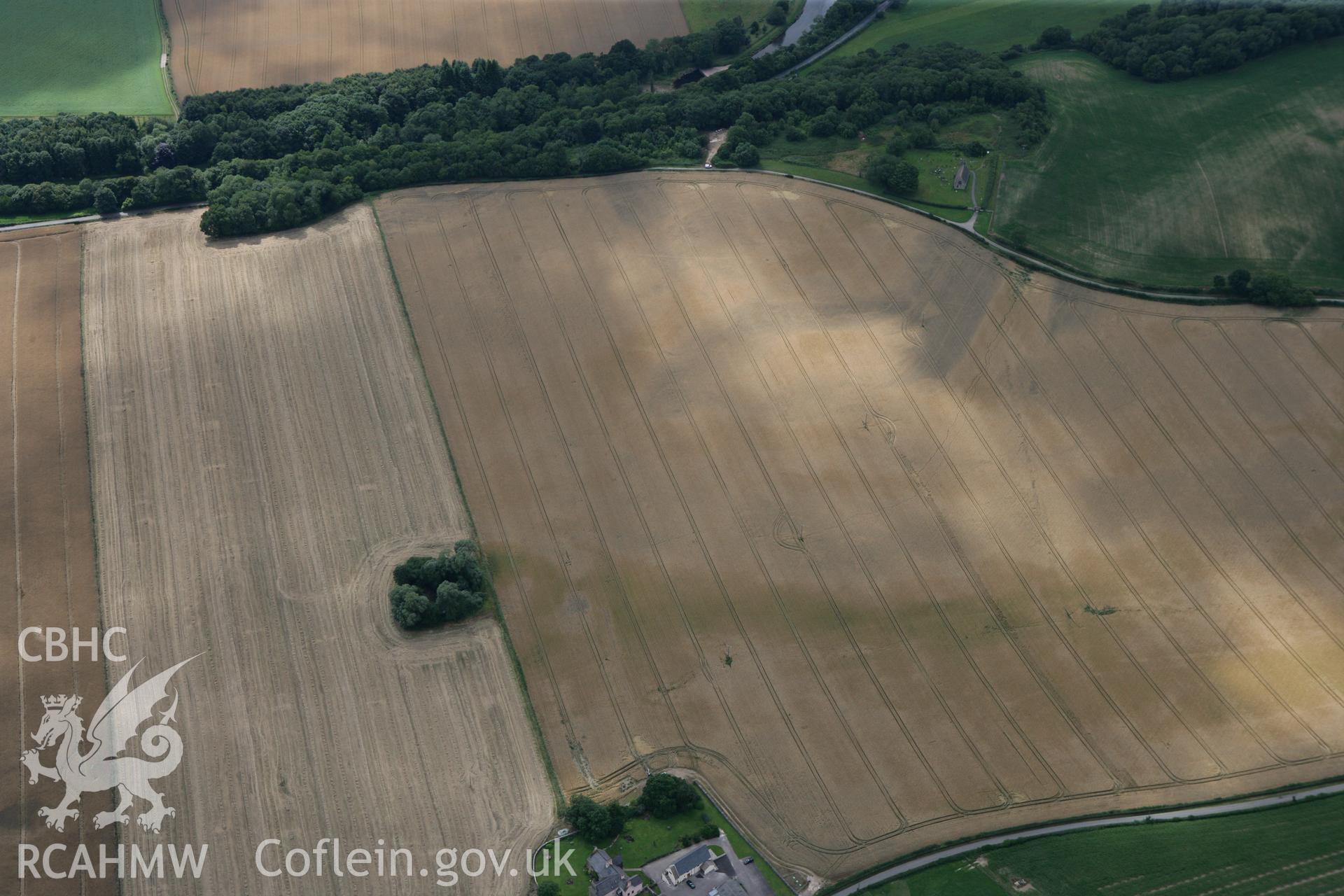 RCAHMW colour oblique photograph of Trostrey Court Farm, possible Roman Fort or Camp. Taken by Toby Driver on 29/07/2010.