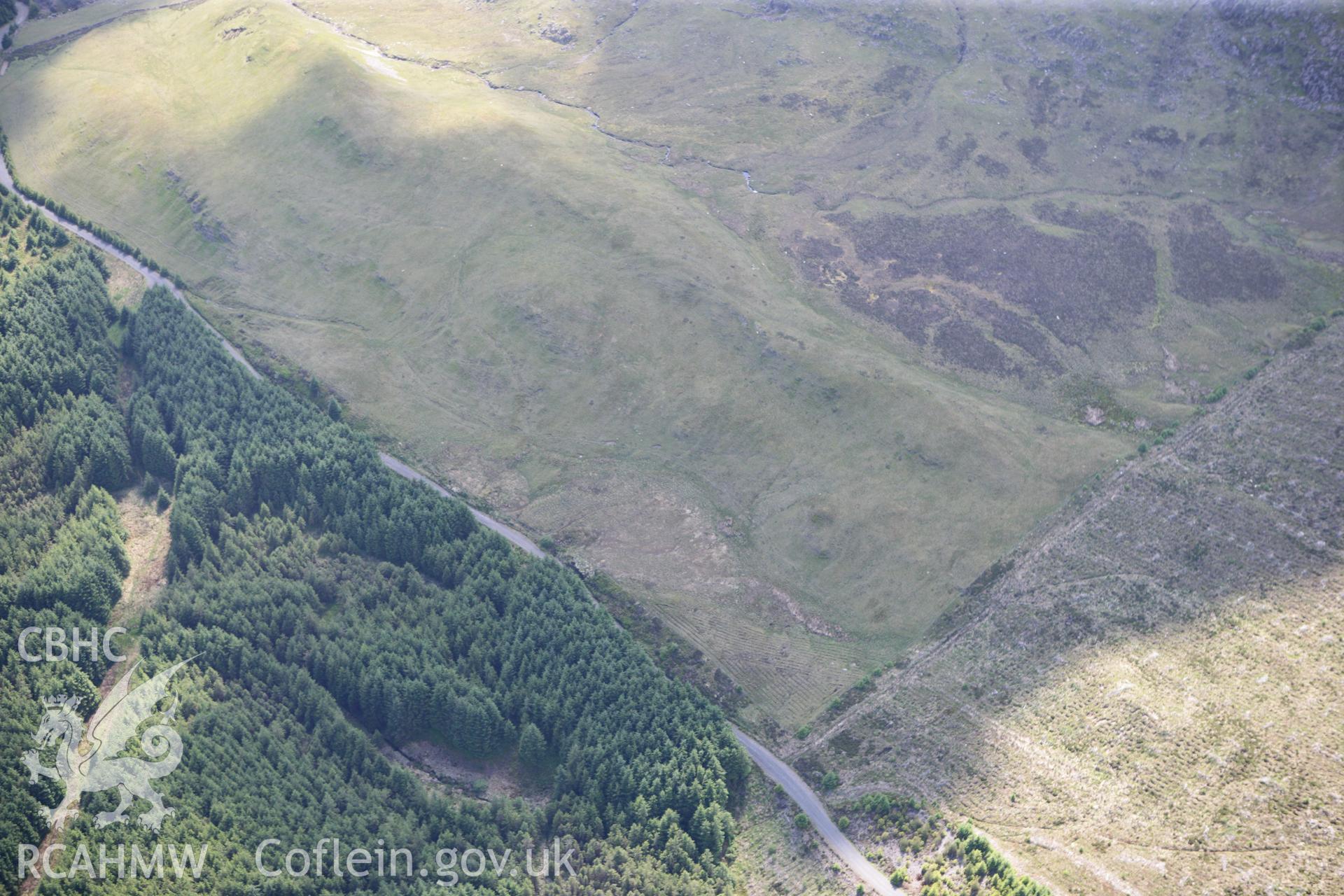 RCAHMW colour oblique photograph of landscape to the west of Ty-newydd-y-mynydd. Taken by Toby Driver on 16/06/2010.