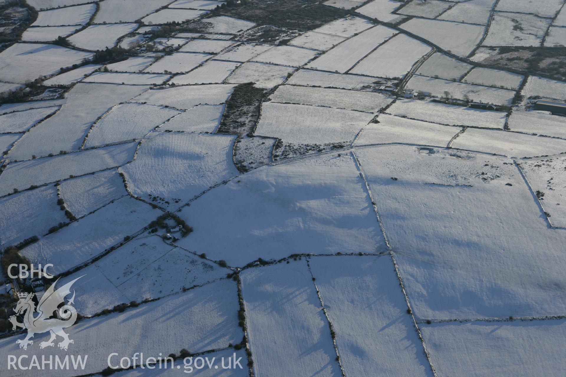 RCAHMW colour oblique photograph of Mynydd Bach, showing possible prehistoric enclosure. Taken by Toby Driver on 01/12/2010.