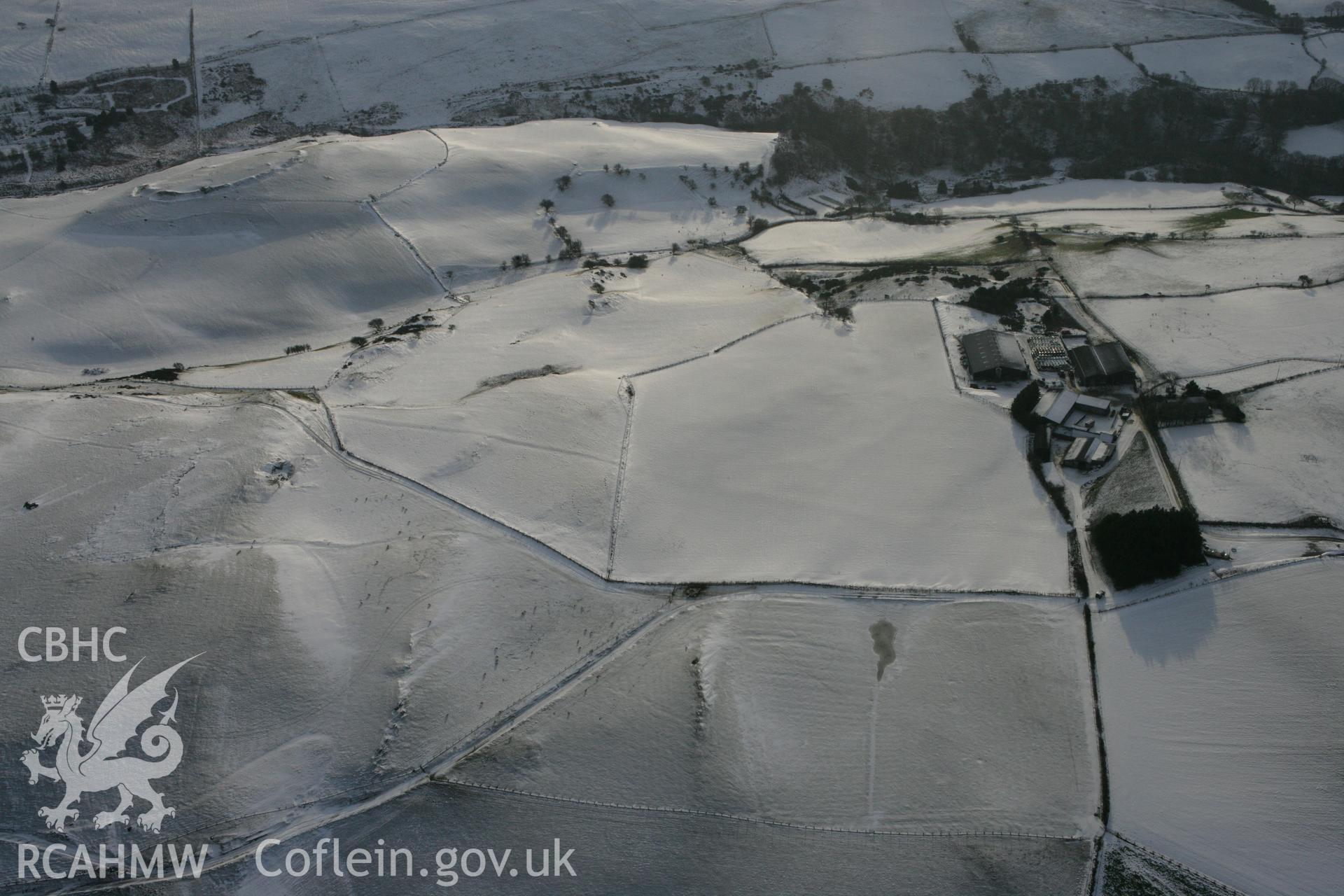 RCAHMW colour oblique photograph of Pen y Castell hillfort, winter landscape from the north. Taken by Toby Driver on 02/12/2010.