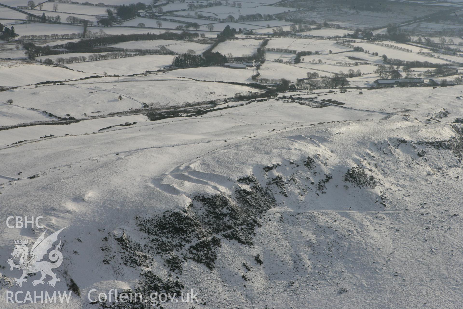 RCAHMW colour oblique photograph of Pen-y-ffrwd Llwyd hillfort. Taken by Toby Driver on 02/12/2010.