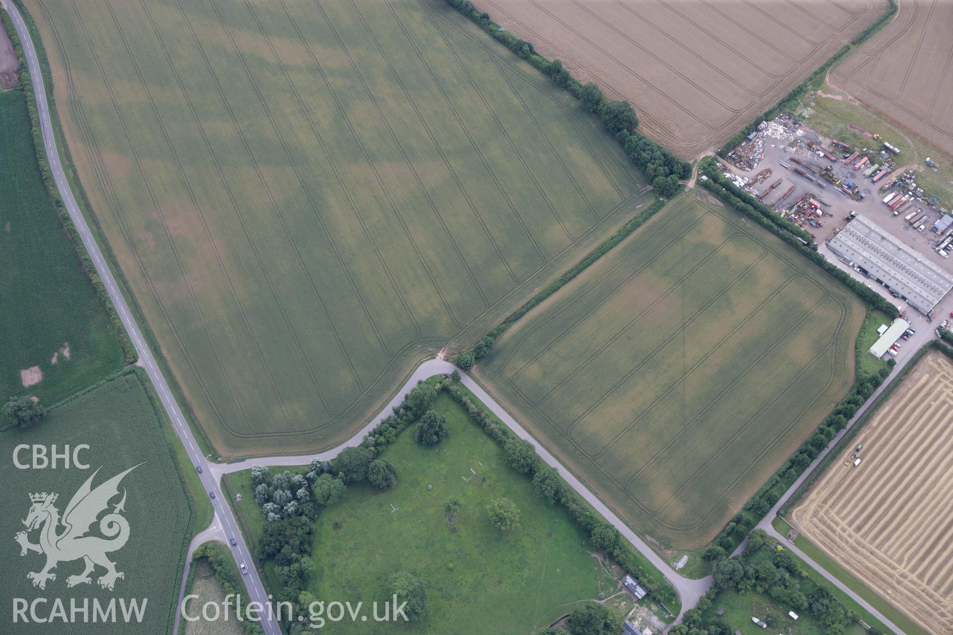 RCAHMW colour oblique photograph of Llancayo Farm Cropmark Enclosures. Taken by Toby Driver on 29/07/2010.