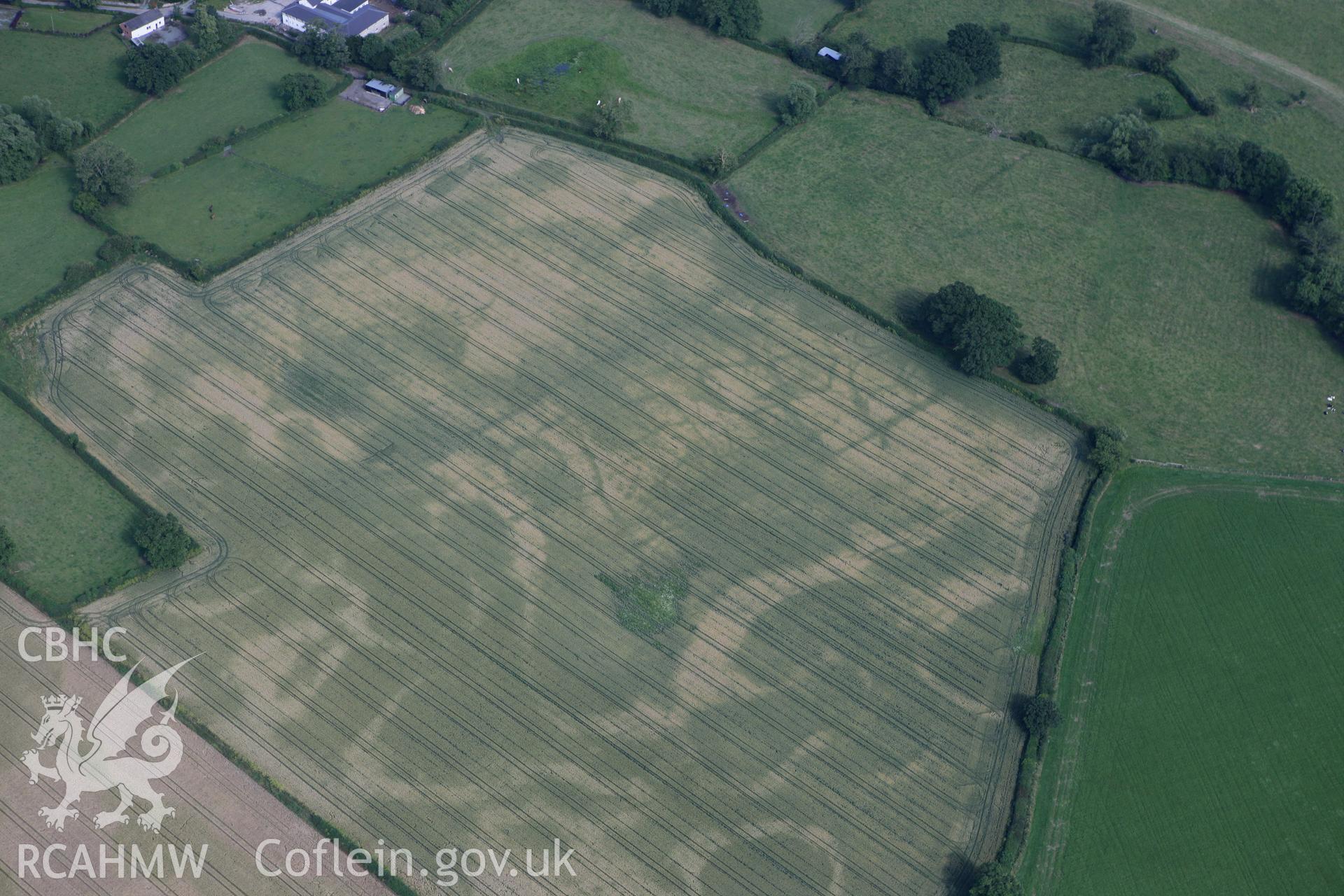 RCAHMW colour oblique photograph of Llandrinio Prehistoric Settlement. Taken by Toby Driver on 21/07/2010.