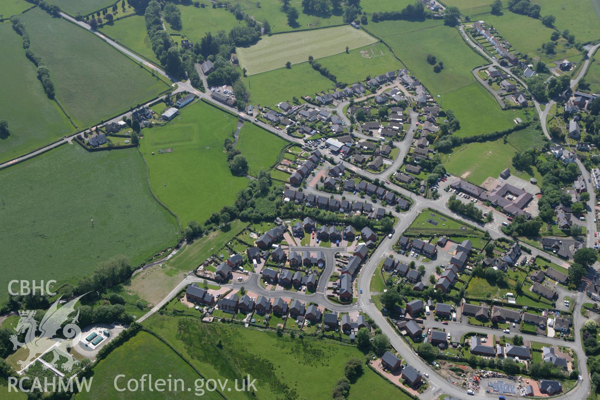 RCAHMW colour oblique photograph of Ysgol Rhiw Bechan, Tregynon. Taken by Toby Driver on 16/06/2010.