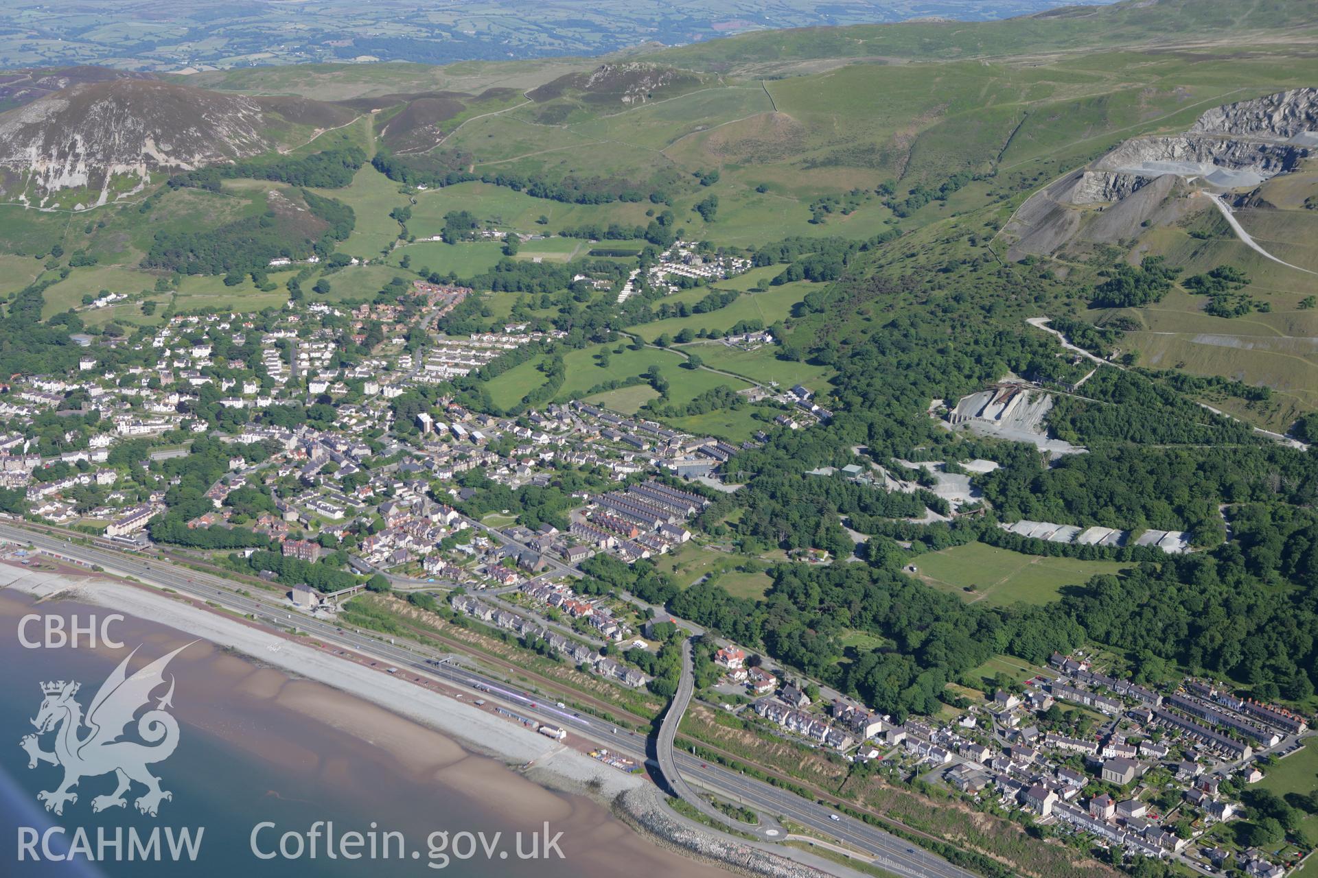RCAHMW colour oblique photograph of Penmaenmawr town. Taken by Toby Driver on 16/06/2010.