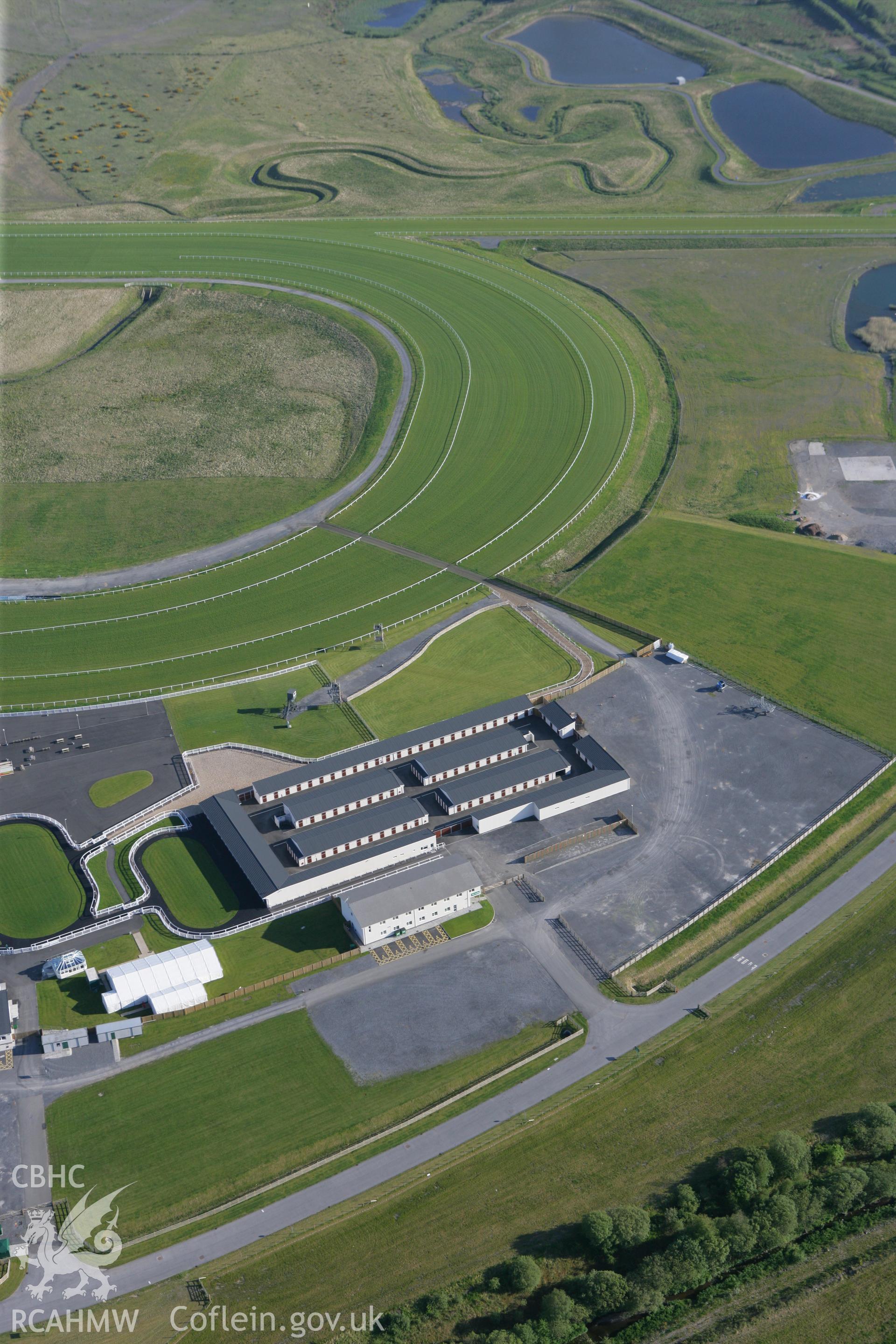 RCAHMW colour oblique photograph of Ffos Las Racecourse. Taken by Toby Driver on 24/05/2010.