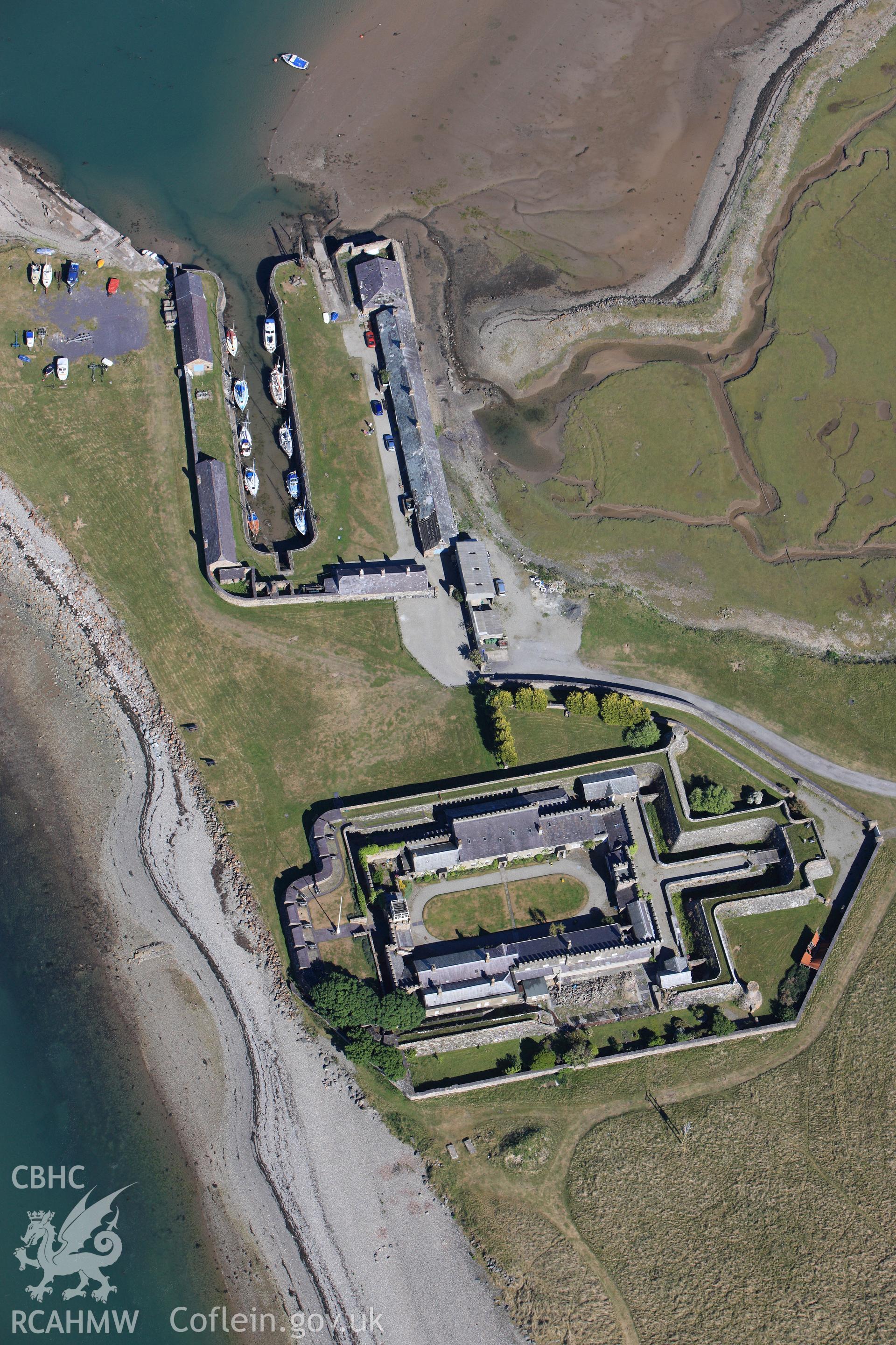 RCAHMW colour oblique photograph of Fort Belan and Fort Belan dockyard. Taken by Toby Driver on 16/06/2010.