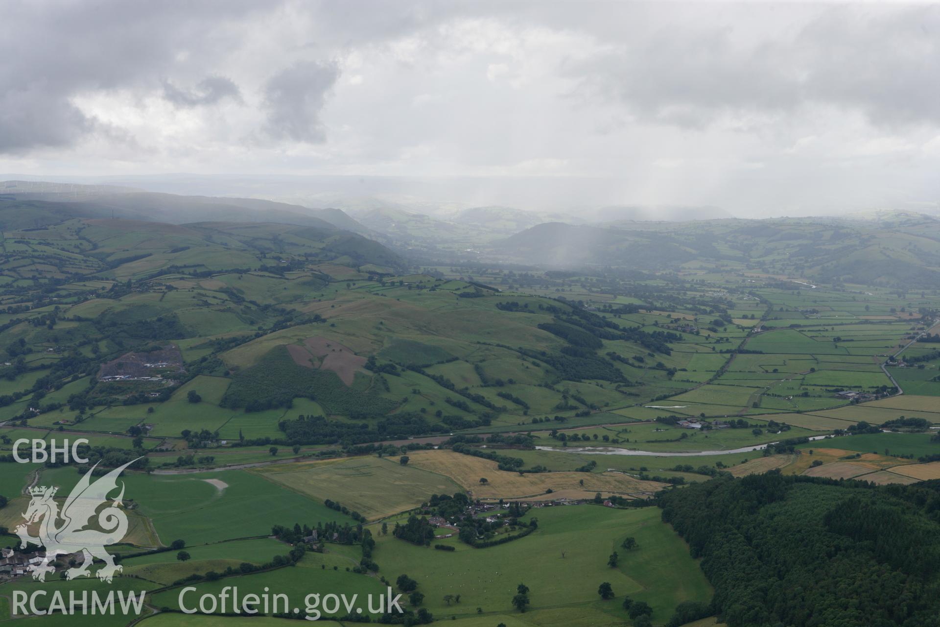 RCAHMW colour oblique photograph of landscape looking west down Severn Valley, over Aberhafesp. Taken by Toby Driver on 21/07/2010.