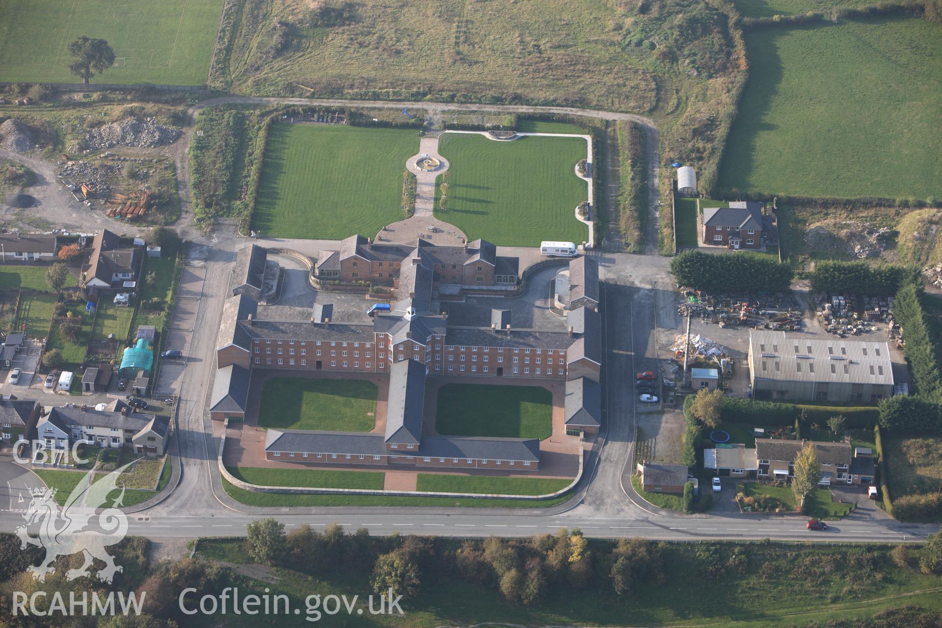 RCAHMW colour oblique photograph of Union Workhouse (Llys Madwyn Hospital), Caersws. Taken by Toby Driver on 13/10/2010.