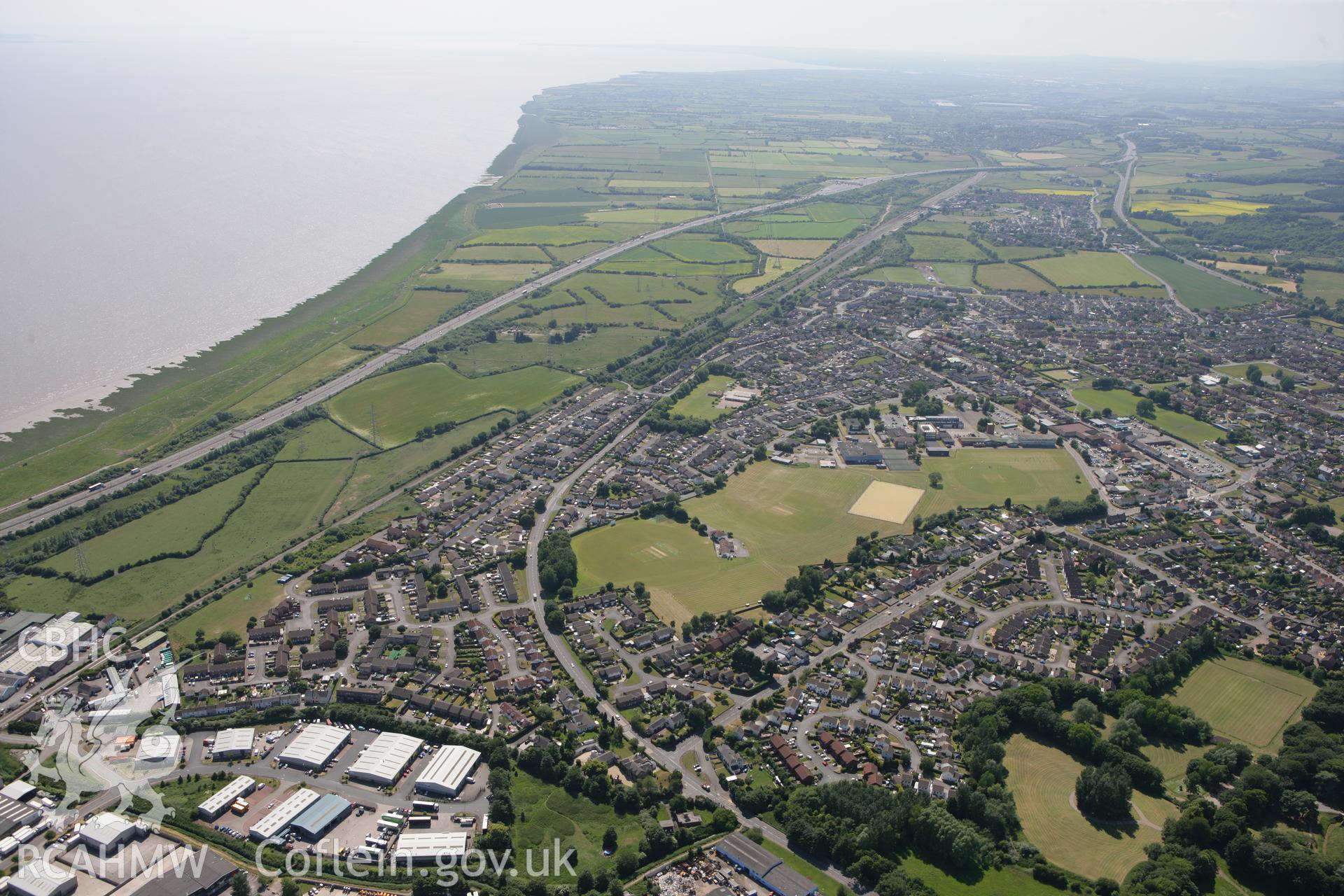 RCAHMW colour oblique photograph of Caldicot, from the east, with Caldicot Castle in the foreground. Taken by Toby Driver on 21/06/2010.