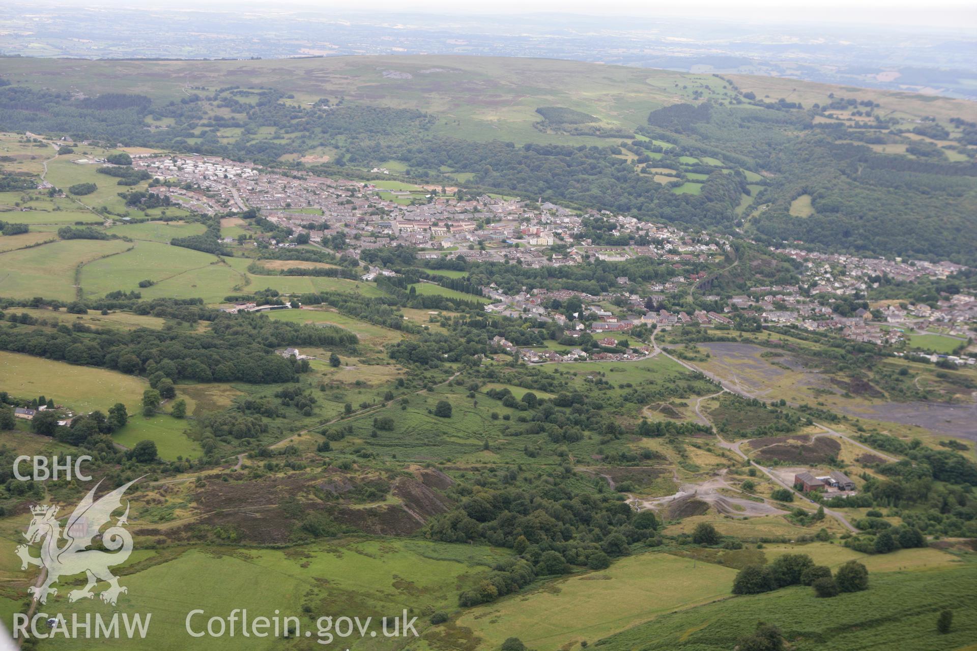 RCAHMW colour oblique photograph of Cwmsychan Red Ash Colliery, from the west, with Abersychan in the distance,. Taken by Toby Driver on 29/07/2010.