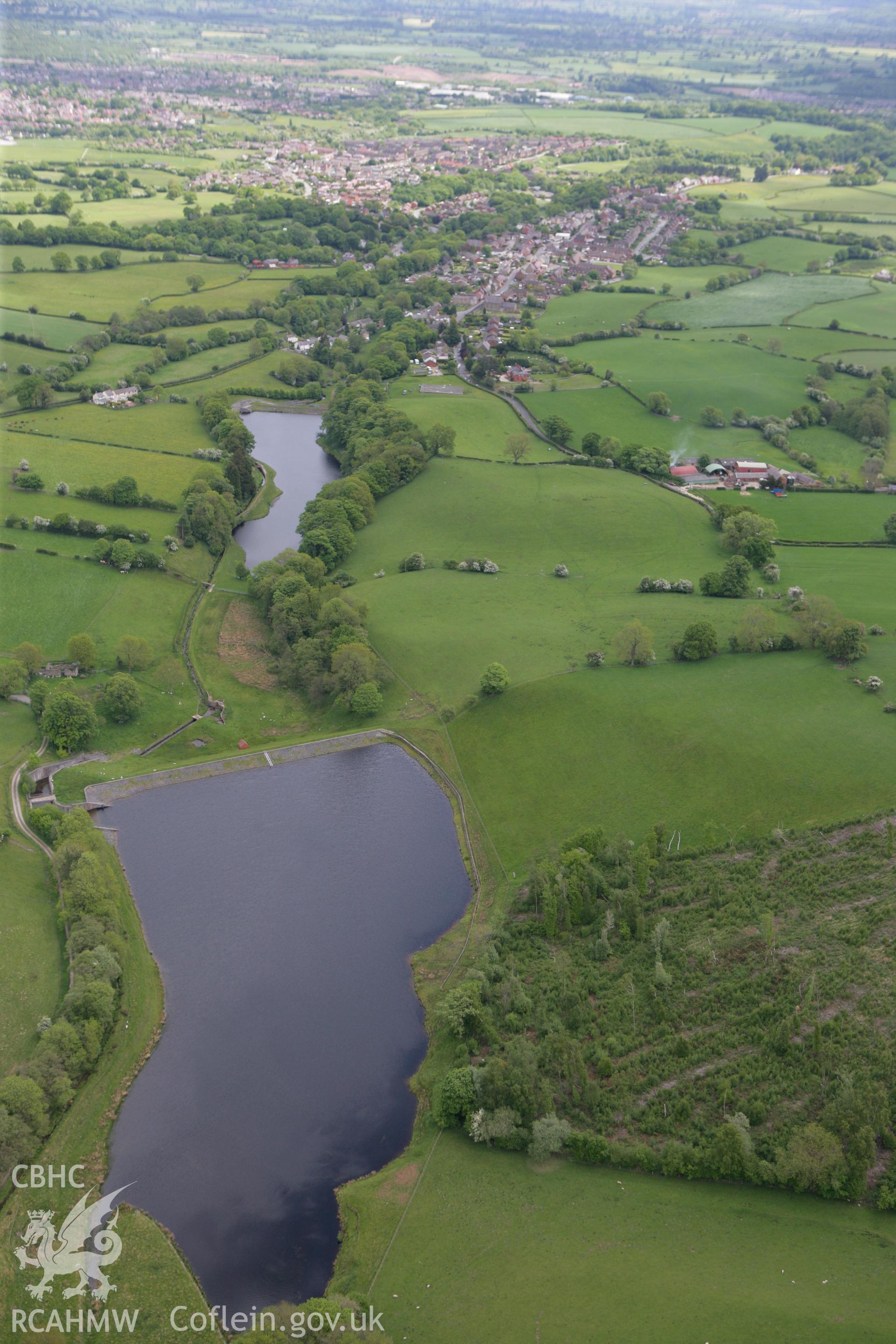 RCAHMW colour oblique photograph of Penycae, Wrexham, from the west, with reservoir in the foreground. Taken by Toby Driver on 27/05/2010.