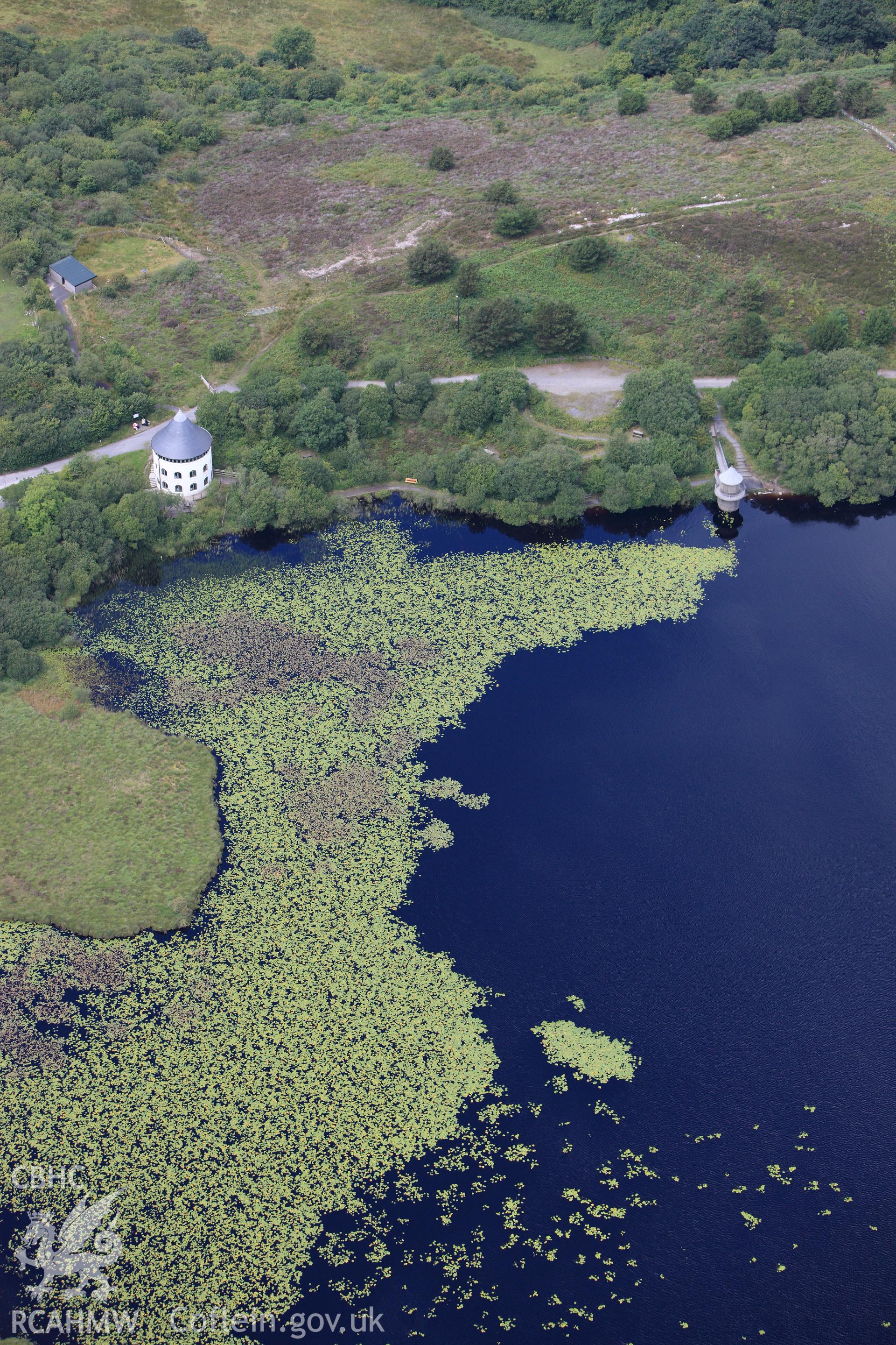 RCAHMW colour oblique photograph of Llyn Llech Owain and visitors centre. Taken by Toby Driver on 29/07/2010.