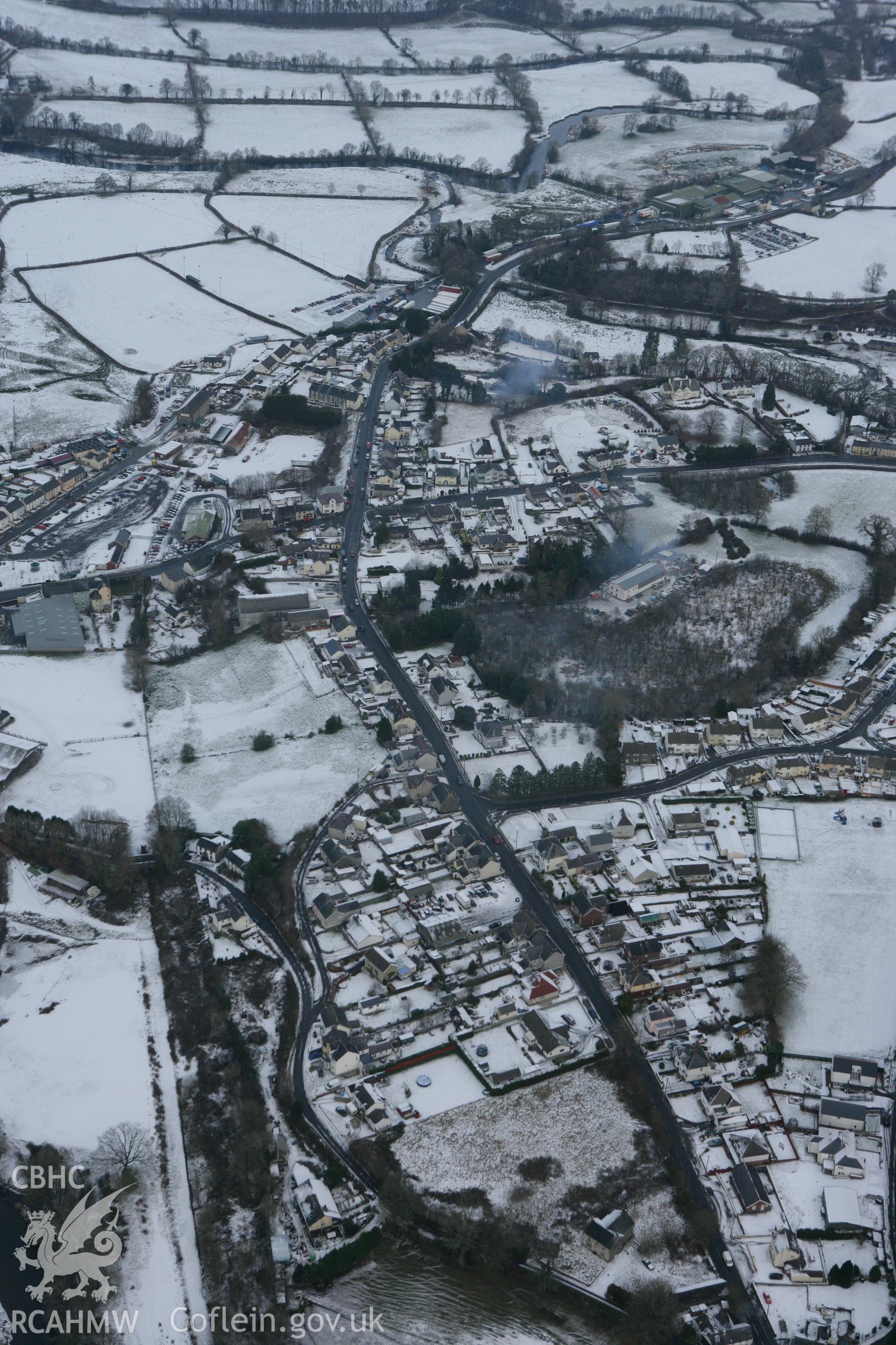 RCAHMW colour oblique photograph of Llanybydder village. Taken by Toby Driver on 02/12/2010.
