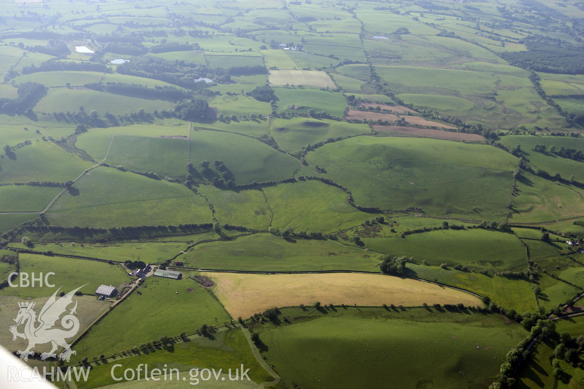 RCAHMW colour oblique photograph of Bwrdd-Tri, Arglwydd. Taken by Toby Driver on 16/06/2010.