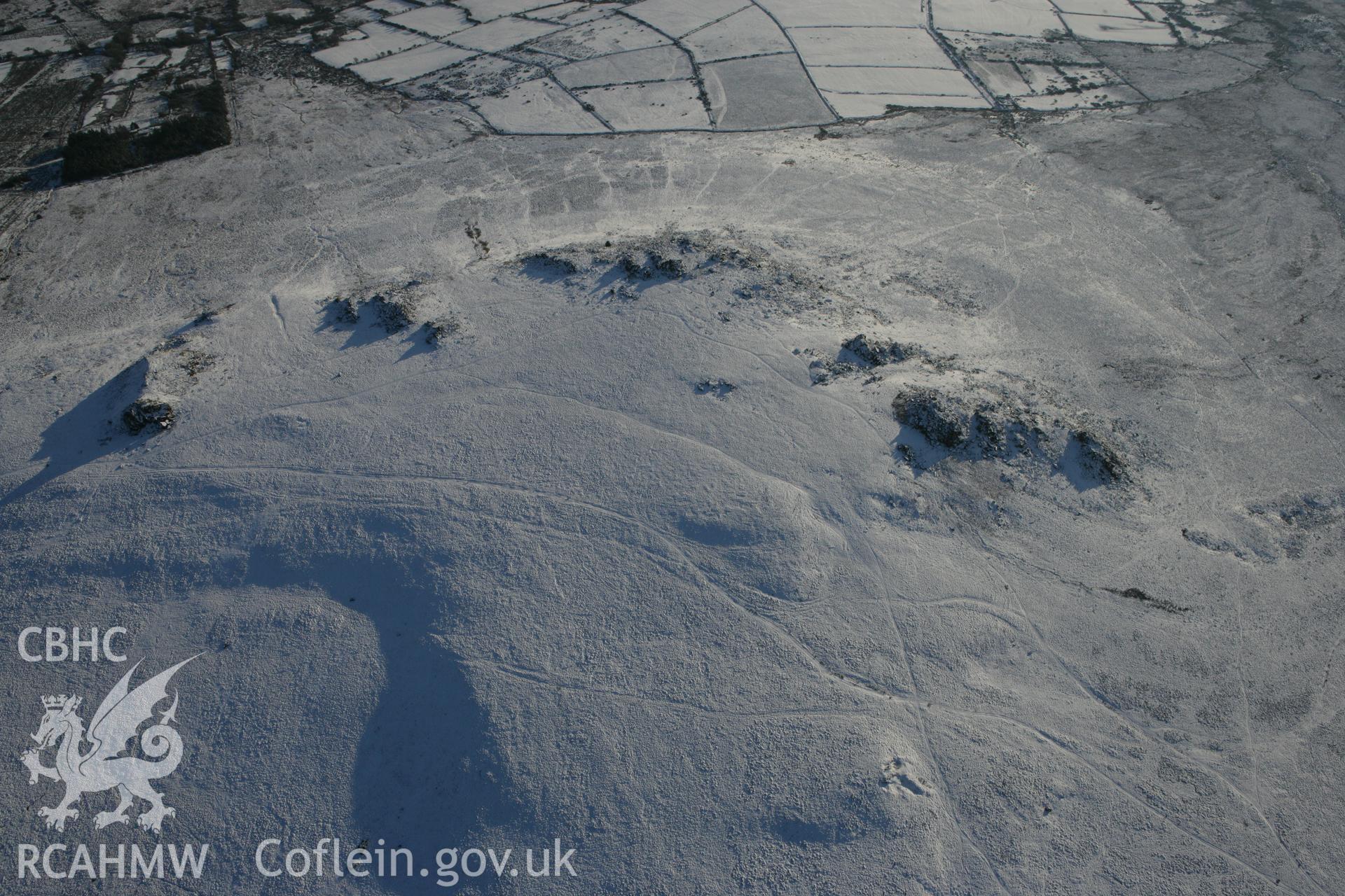 RCAHMW colour oblique photograph of Carn Menyn outcrops. Taken by Toby Driver on 01/12/2010.