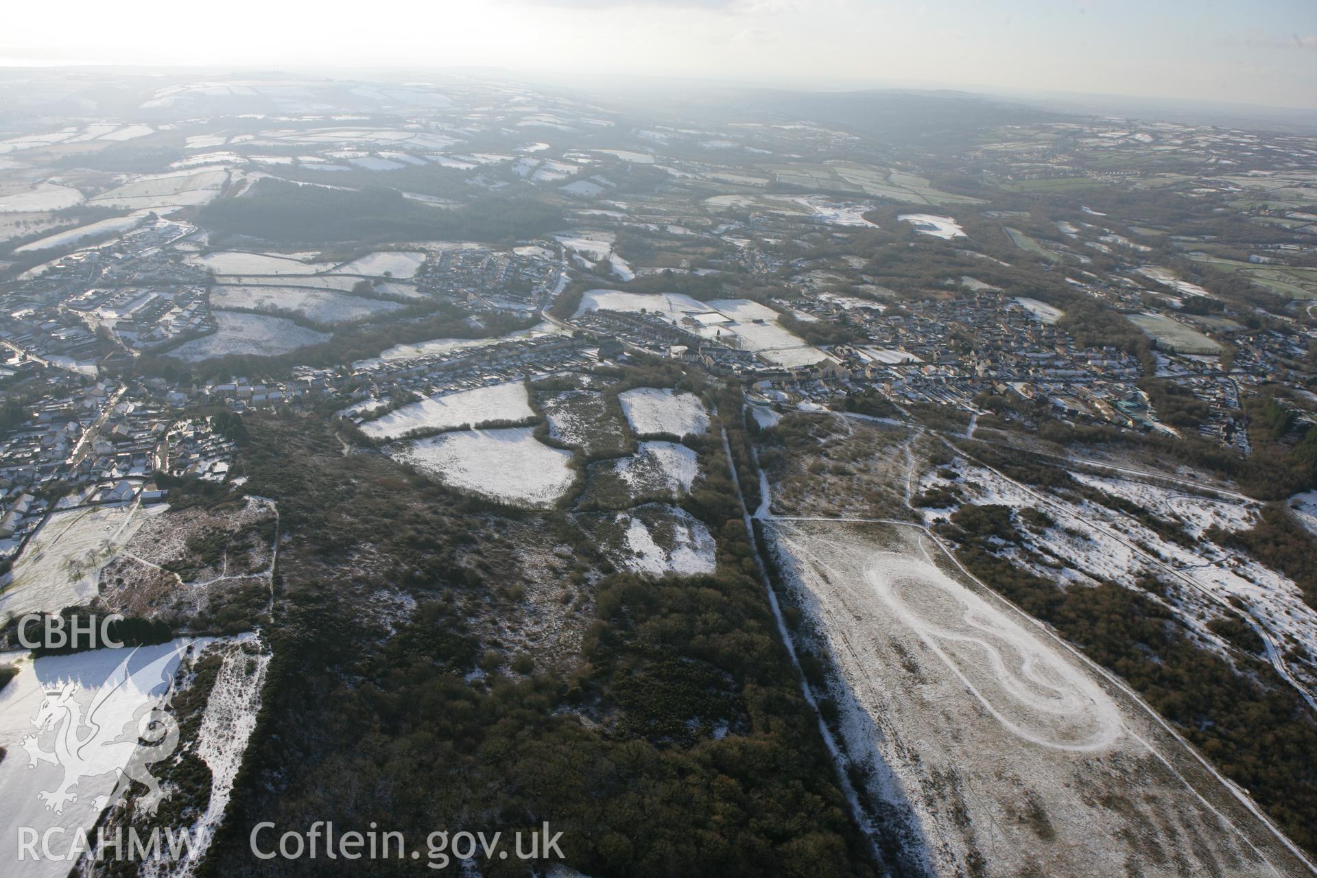 RCAHMW colour oblique photograph of Tumble town from the north-east. Taken by Toby Driver on 01/12/2010.