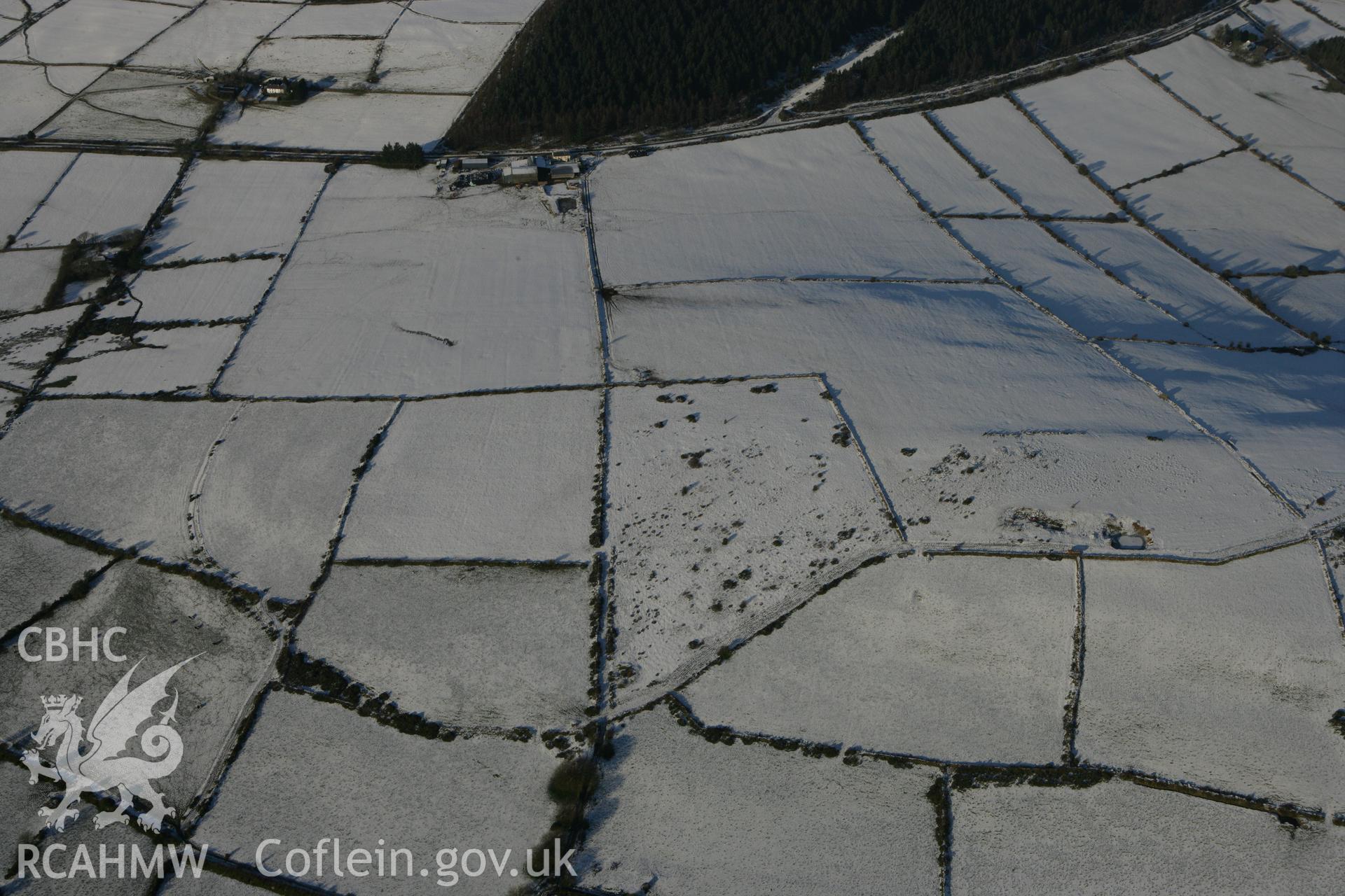 RCAHMW colour oblique photograph of Mynydd Bach, showing possible prehistoric enclosure. Taken by Toby Driver on 01/12/2010.