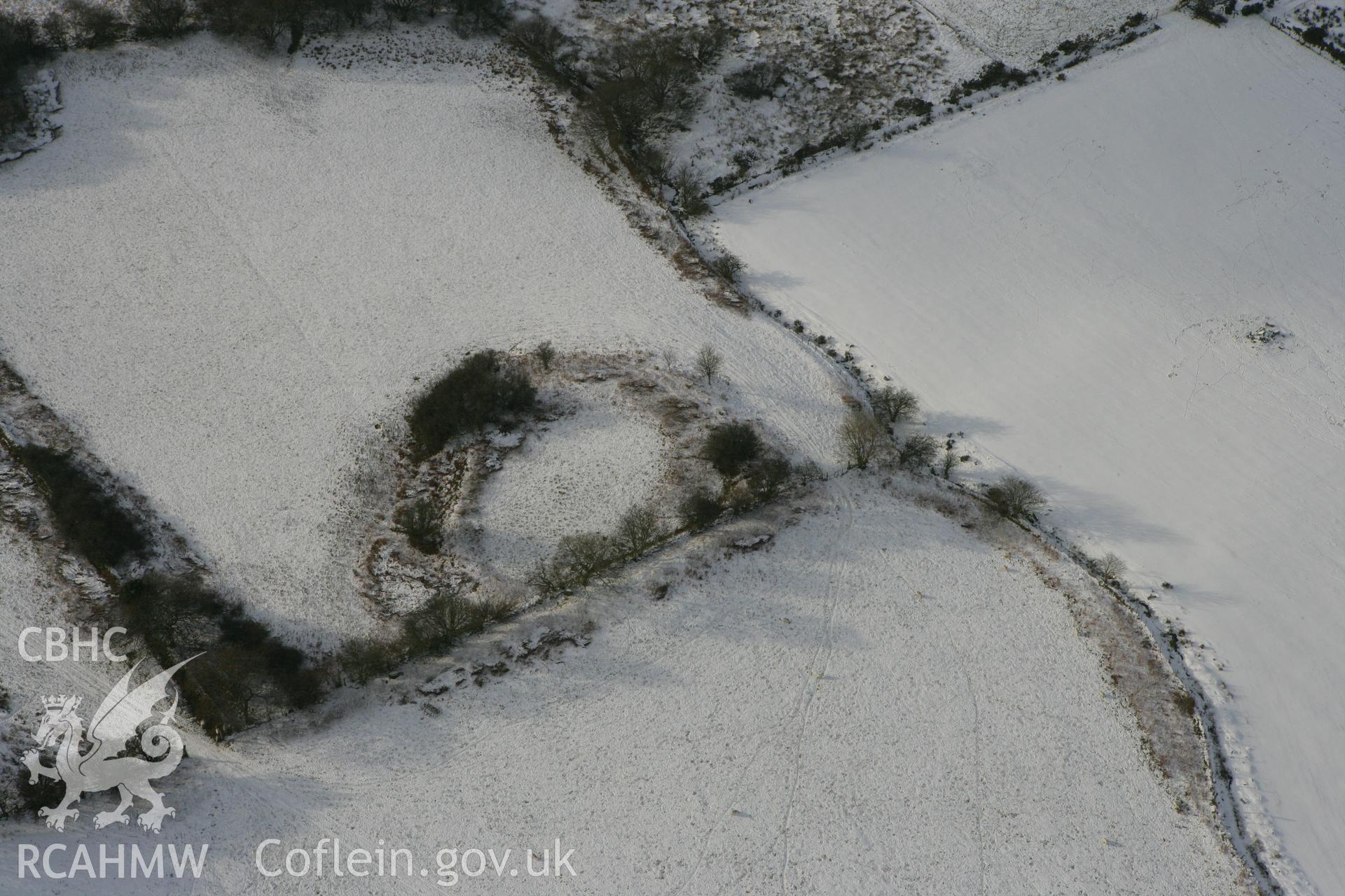 RCAHMW colour oblique photograph of Garreg Lwyd, defended enclosure. Taken by Toby Driver on 02/12/2010.