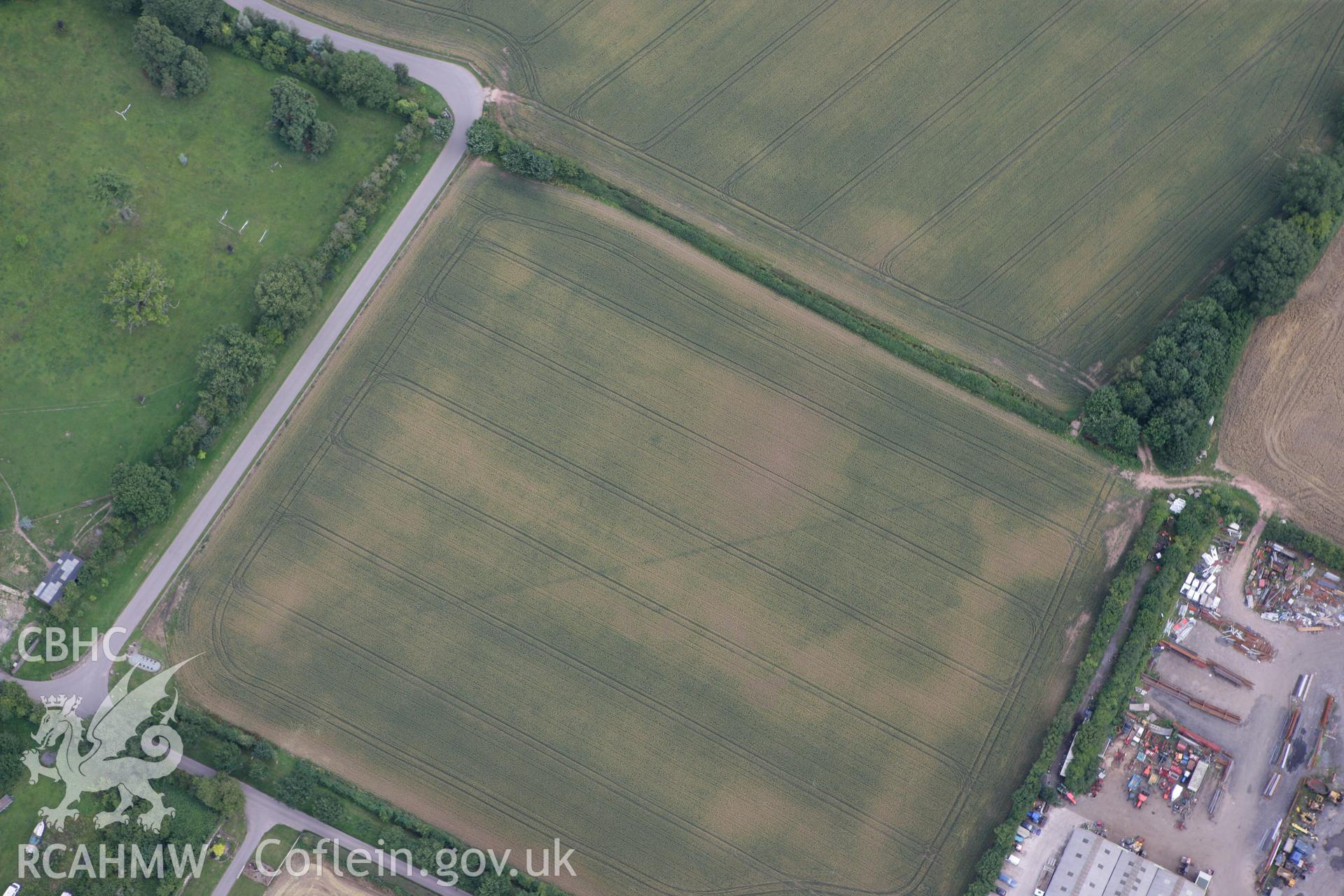 RCAHMW colour oblique photograph of Llancayo Farm Cropmark Enclosures. Taken by Toby Driver on 29/07/2010.