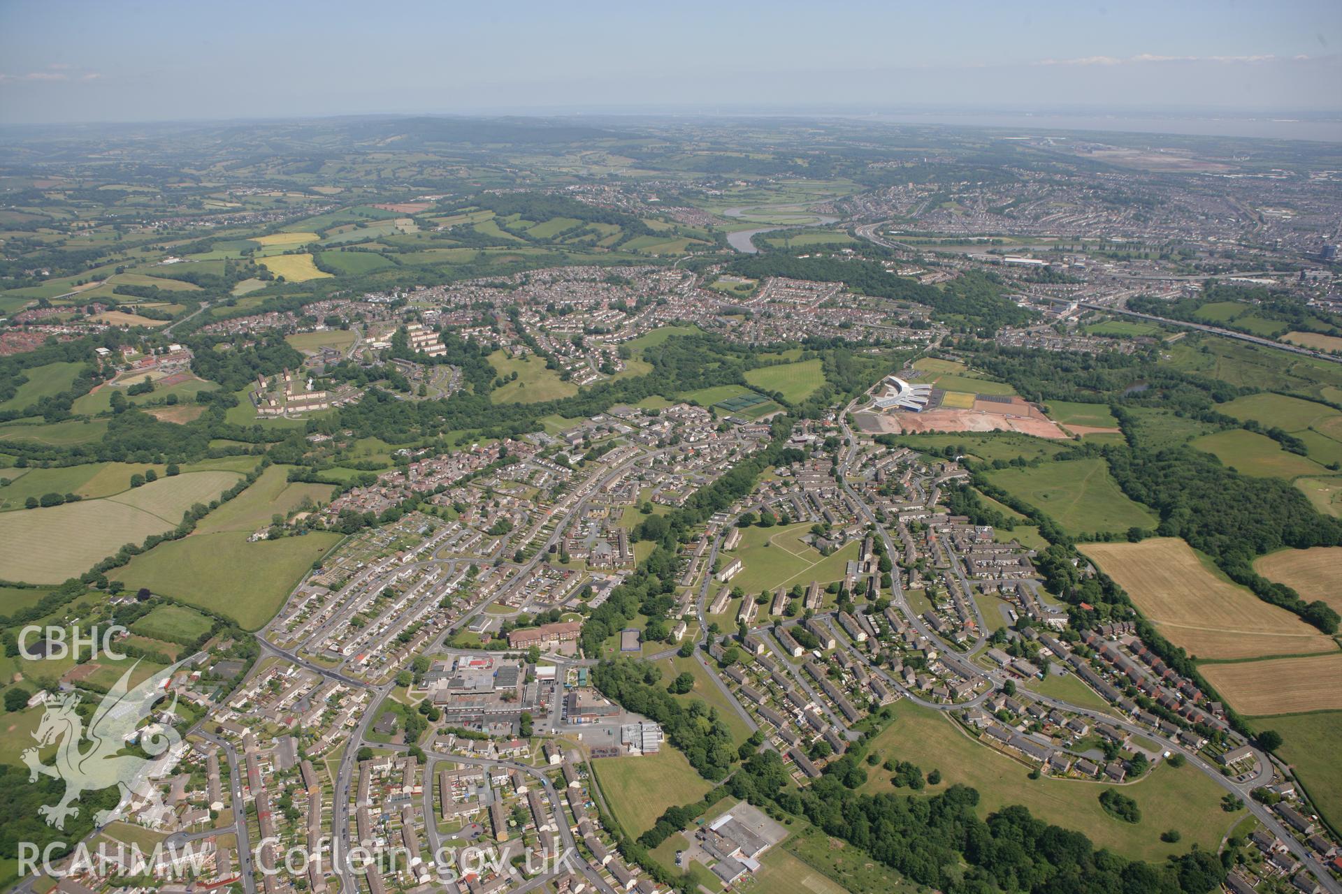 RCAHMW colour oblique photograph of Bettws, Newport from the west, showing Newport High School in the distance. Taken by Toby Driver on 21/06/2010.