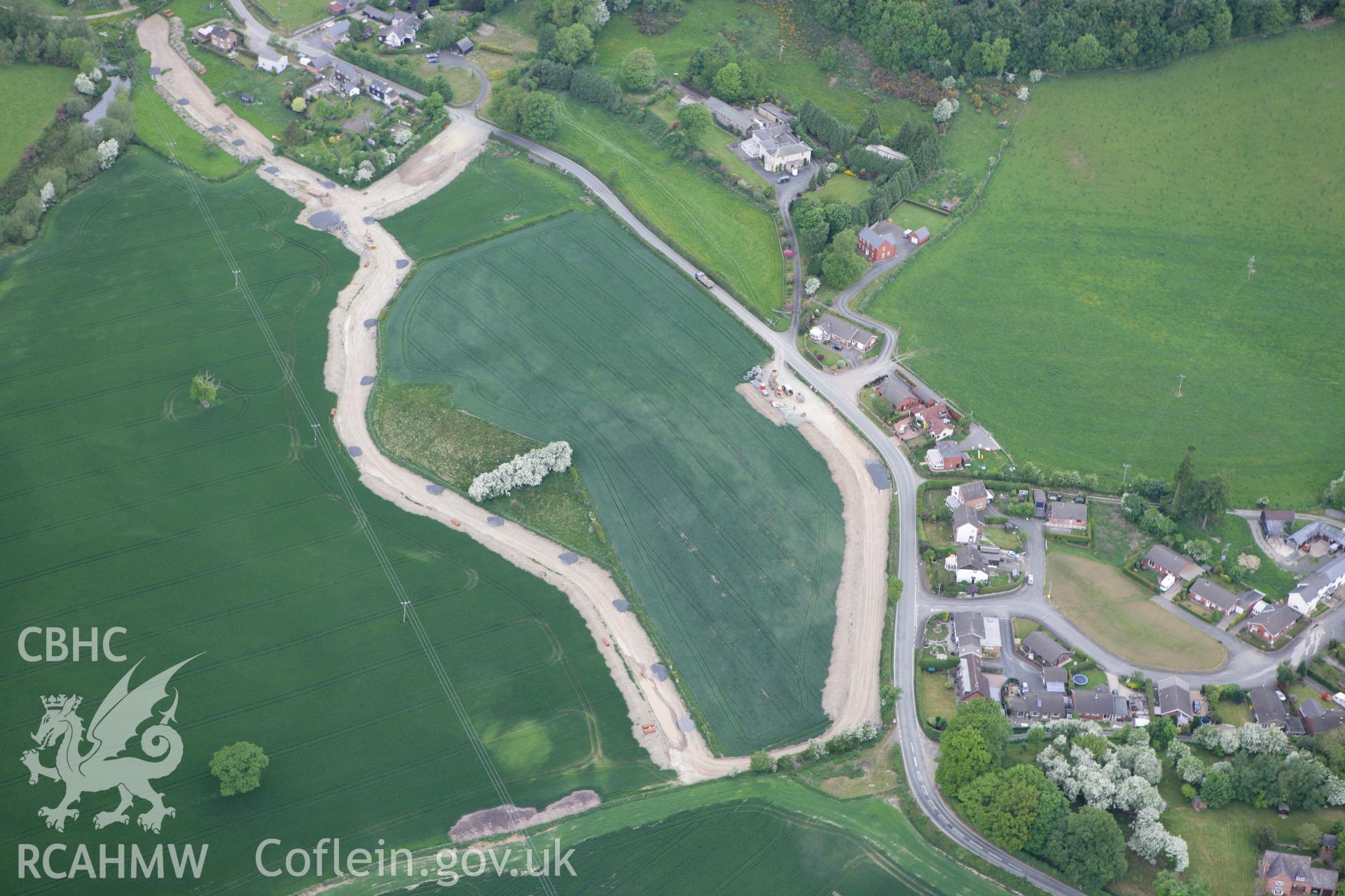 RCAHMW colour oblique photograph of Pentre round barrow. Taken by Toby Driver on 27/05/2010.
