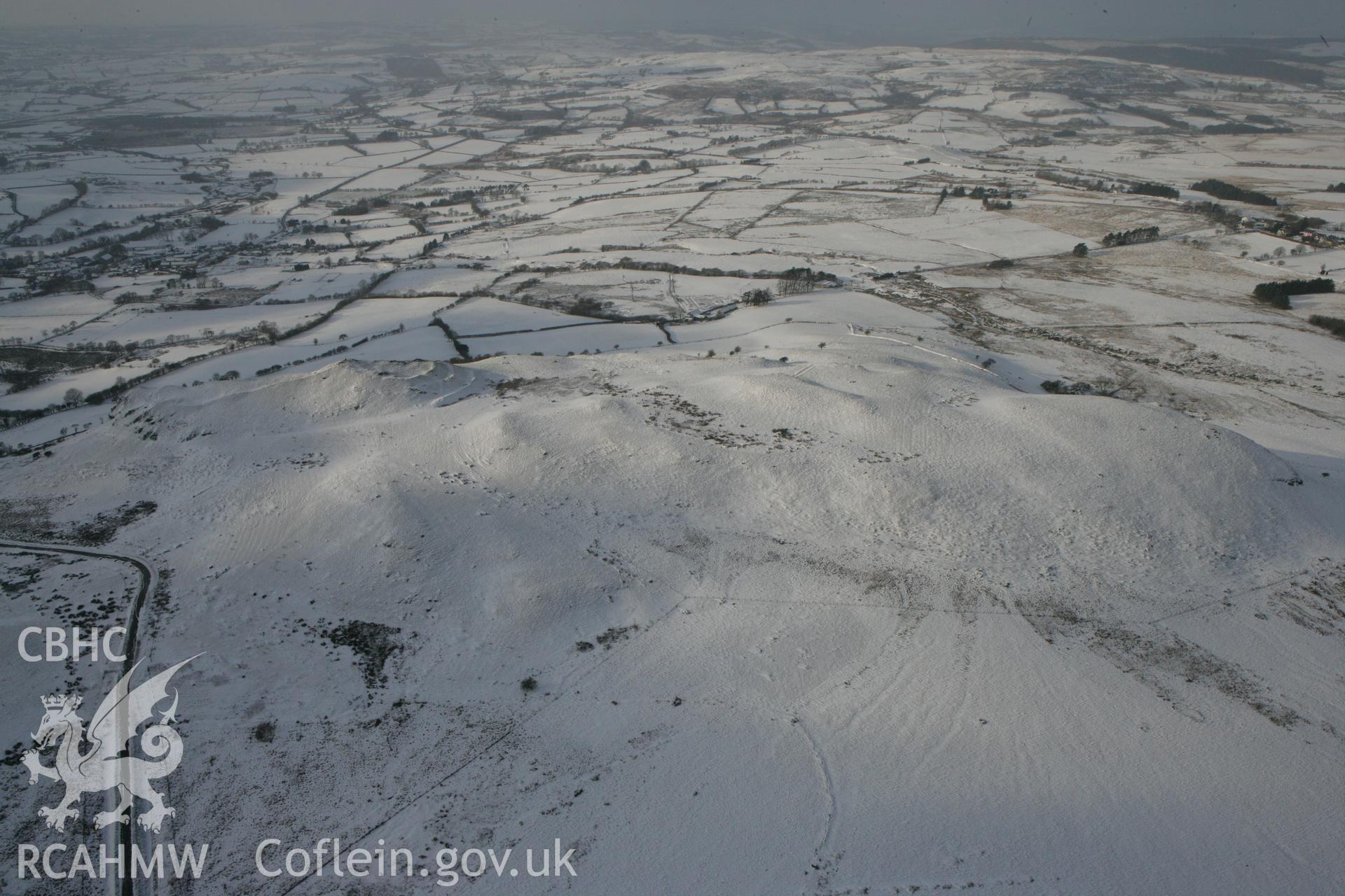 RCAHMW colour oblique photograph of Pen y Bannau hillfort in upland landscape. Taken by Toby Driver on 02/12/2010.