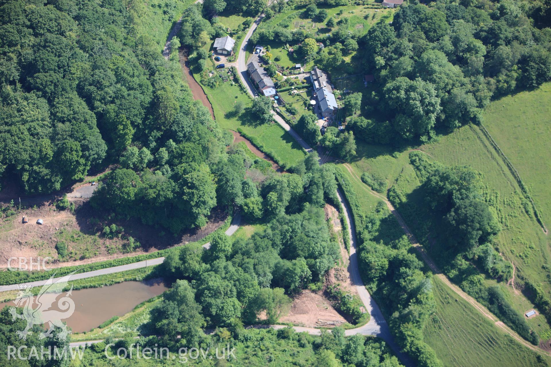 RCAHMW colour oblique photograph of Tintern Upper Wireworks (New Tongs Mill), Tintern. Taken by Toby Driver on 21/06/2010.
