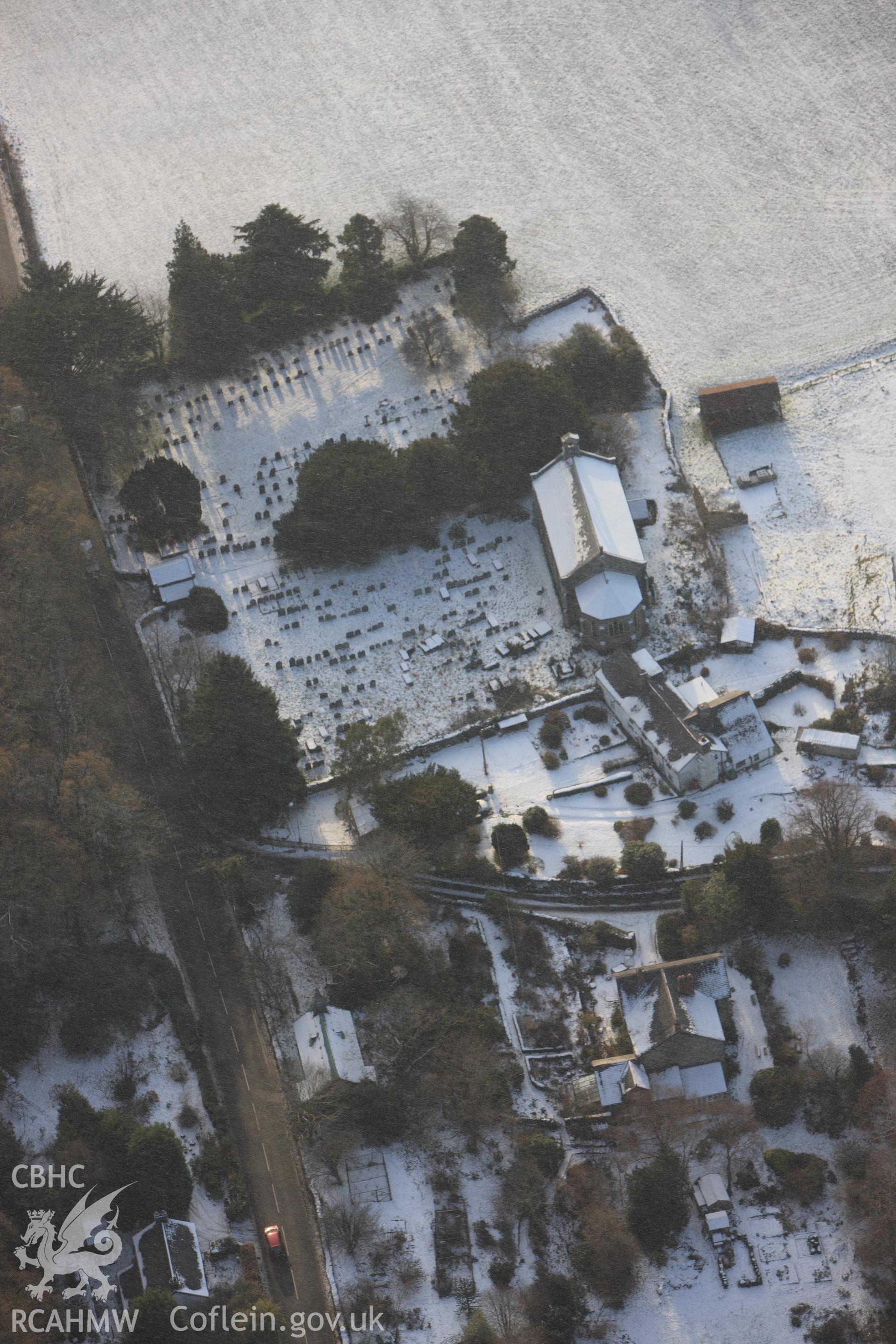 RCAHMW colour oblique photograph of St Michaels Church, Eglwysfach. Taken by Toby Driver on 02/12/2010.