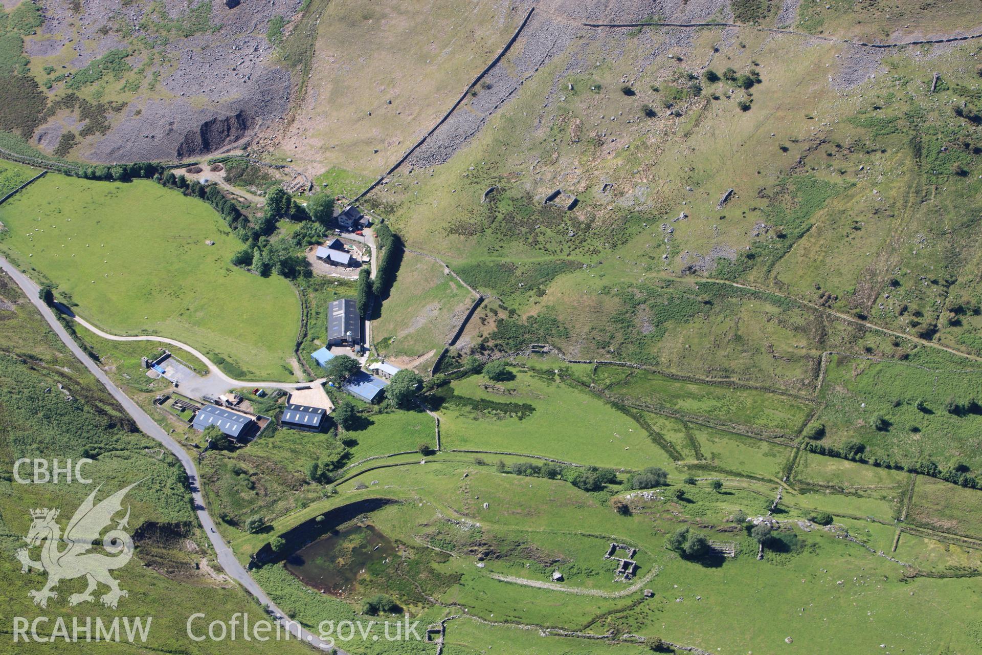 RCAHMW colour oblique photograph of Drws-y-Coed Copper Mine and Prehistoric Settlement. Taken by Toby Driver on 16/06/2010.