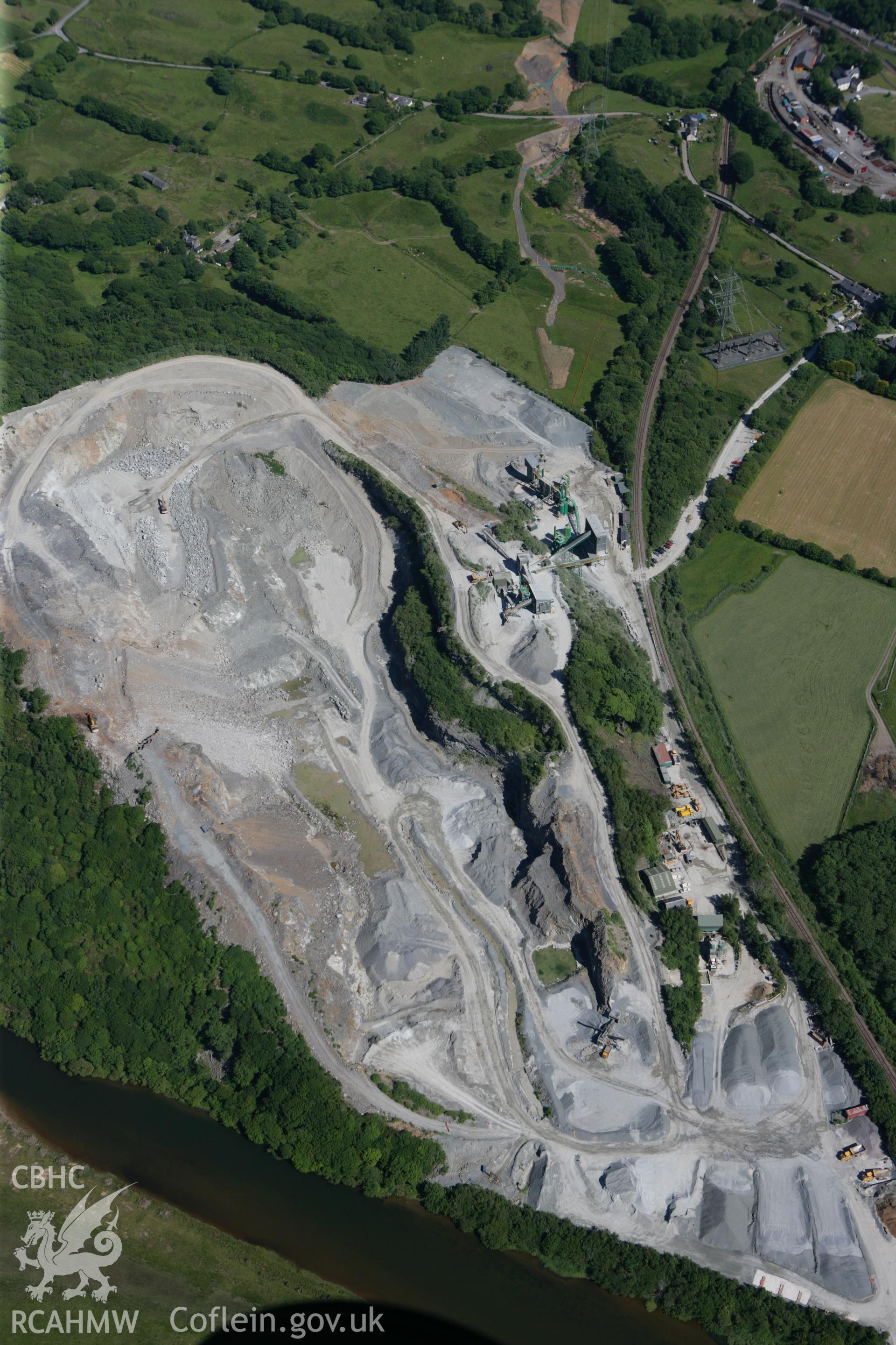 RCAHMW colour oblique photograph of Garth (Ynys Gron) granite quarry. Taken by Toby Driver on 16/06/2010.