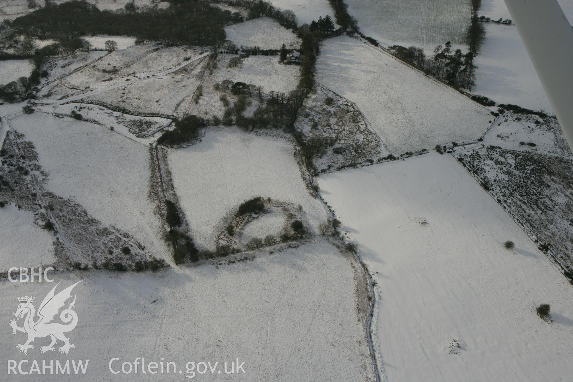 RCAHMW colour oblique photograph of Garreg Lwyd, defended enclosure. Taken by Toby Driver on 02/12/2010.
