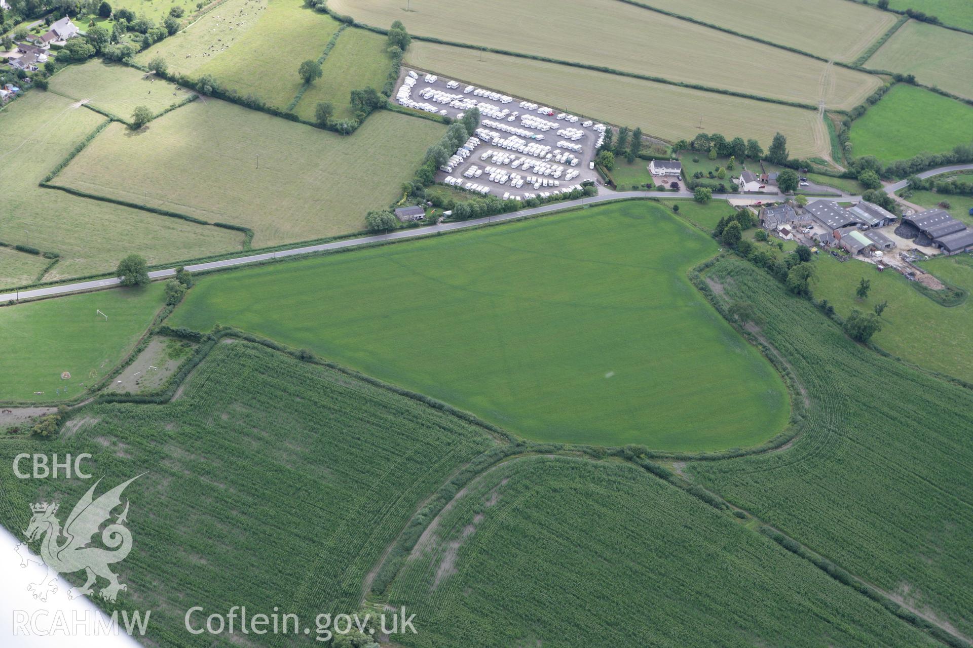 RCAHMW colour oblique photograph of Brick House Farm, Redwick. Taken by Toby Driver on 29/07/2010.