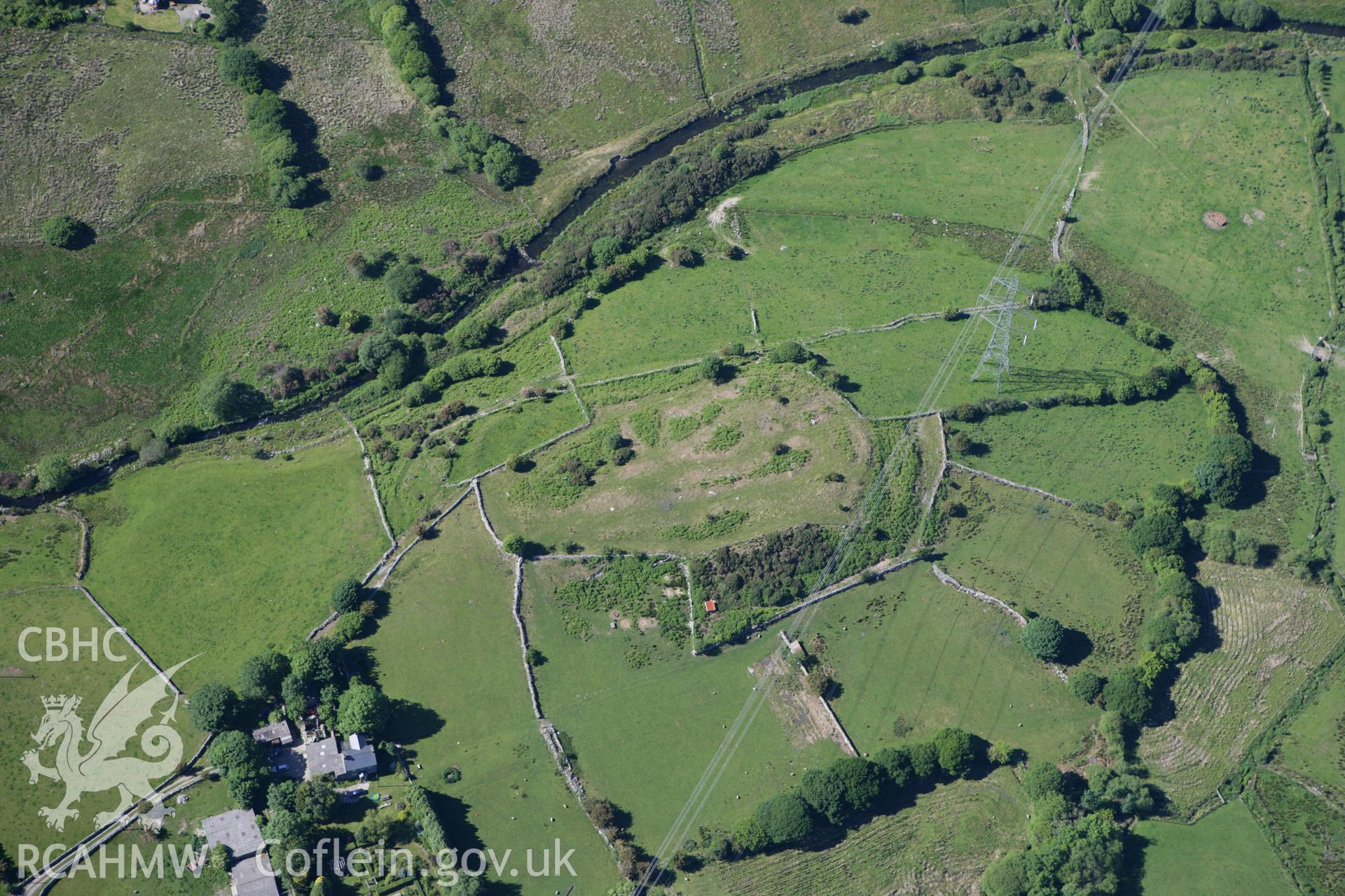 RCAHMW colour oblique photograph of Caer Engan Hillfort. Taken by Toby Driver on 16/06/2010.