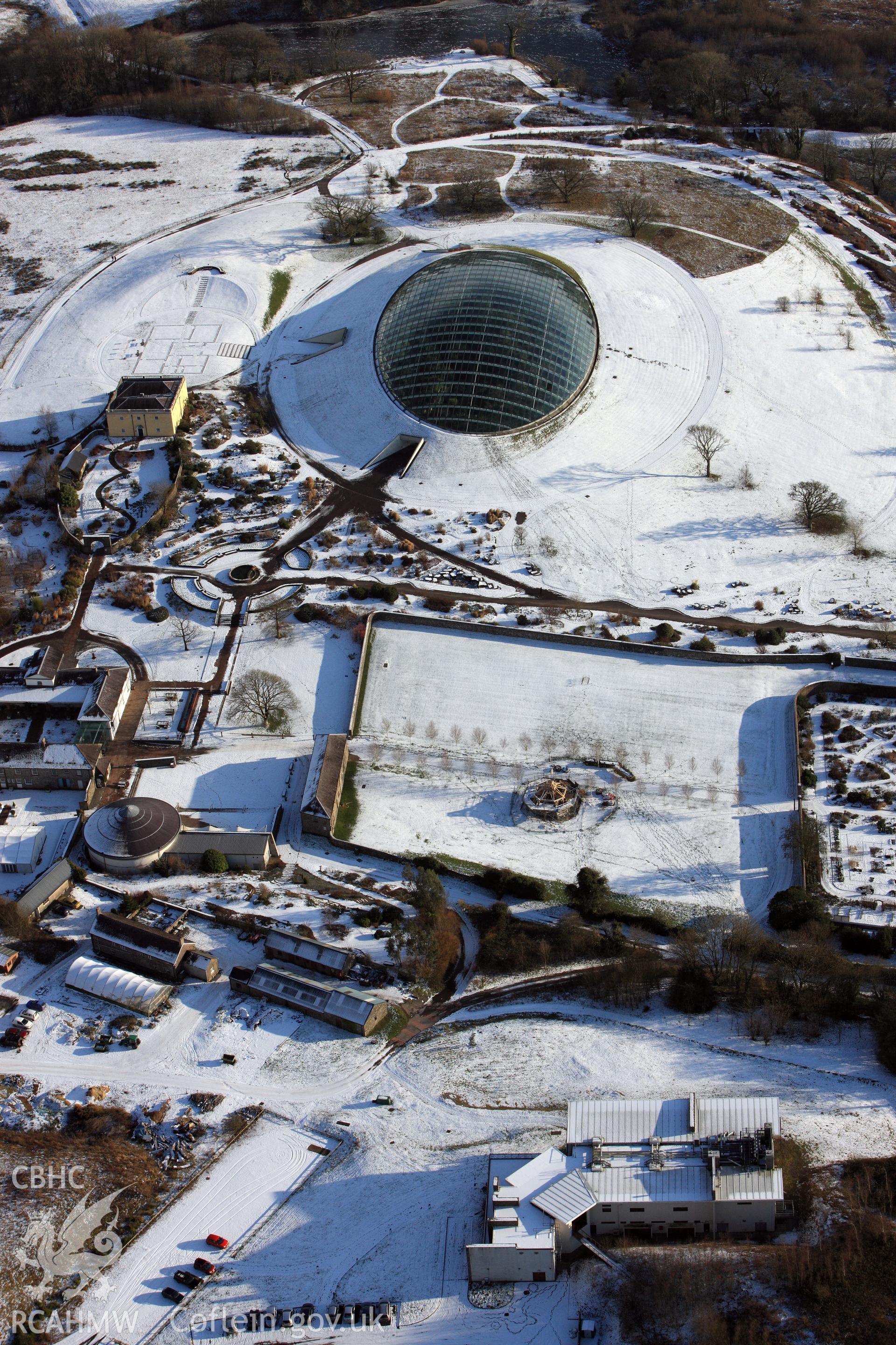 RCAHMW colour oblique aerial photograph of the National Botanic Garden of Wales under snow, by Toby Driver, 01/12/2010.
