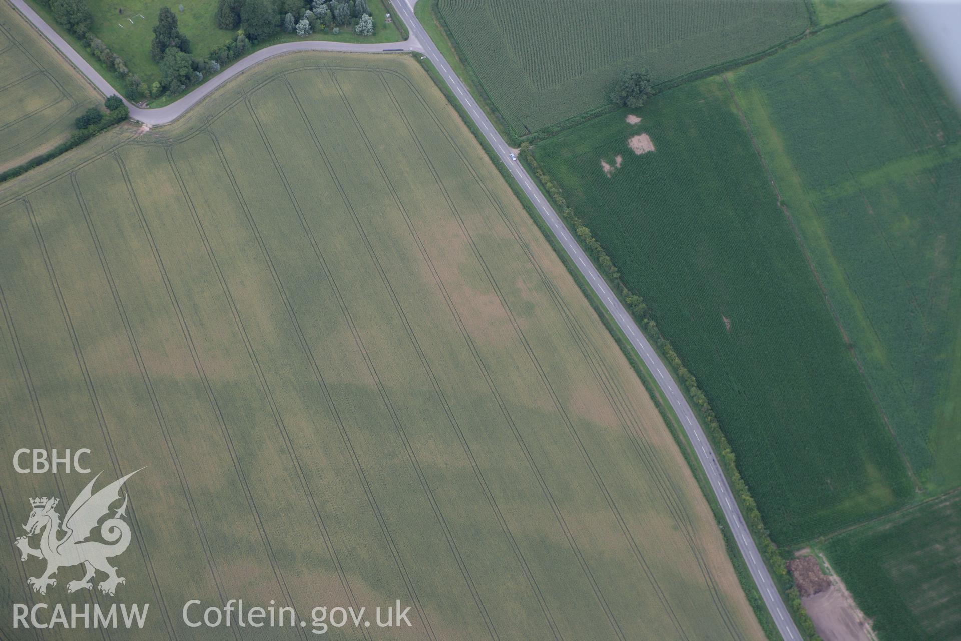 RCAHMW colour oblique photograph of Llancayo Farm Cropmark Enclosures. Taken by Toby Driver on 29/07/2010.