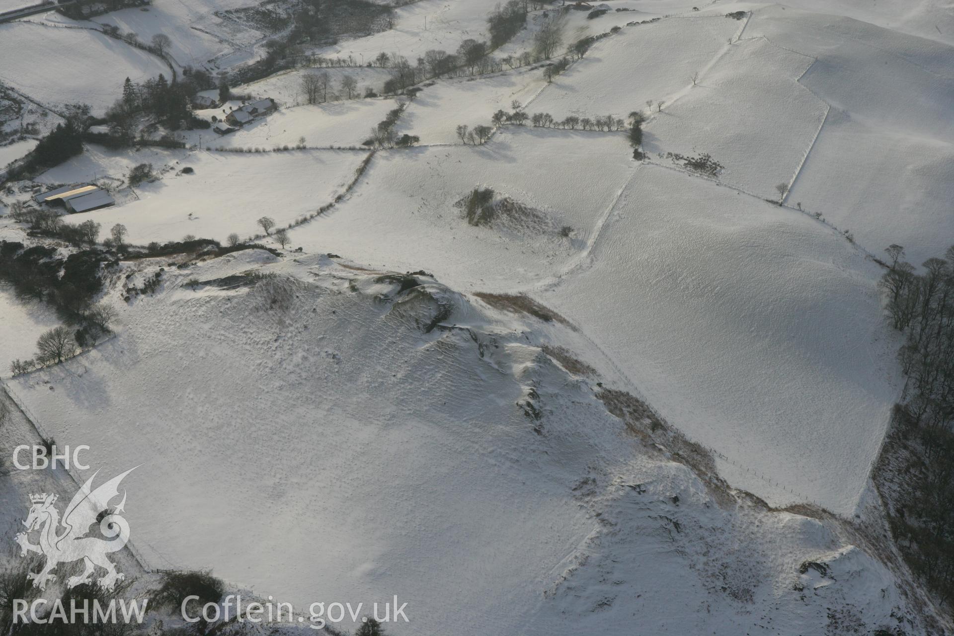 RCAHMW colour oblique photograph of Castell outcrop. Taken by Toby Driver on 02/12/2010.