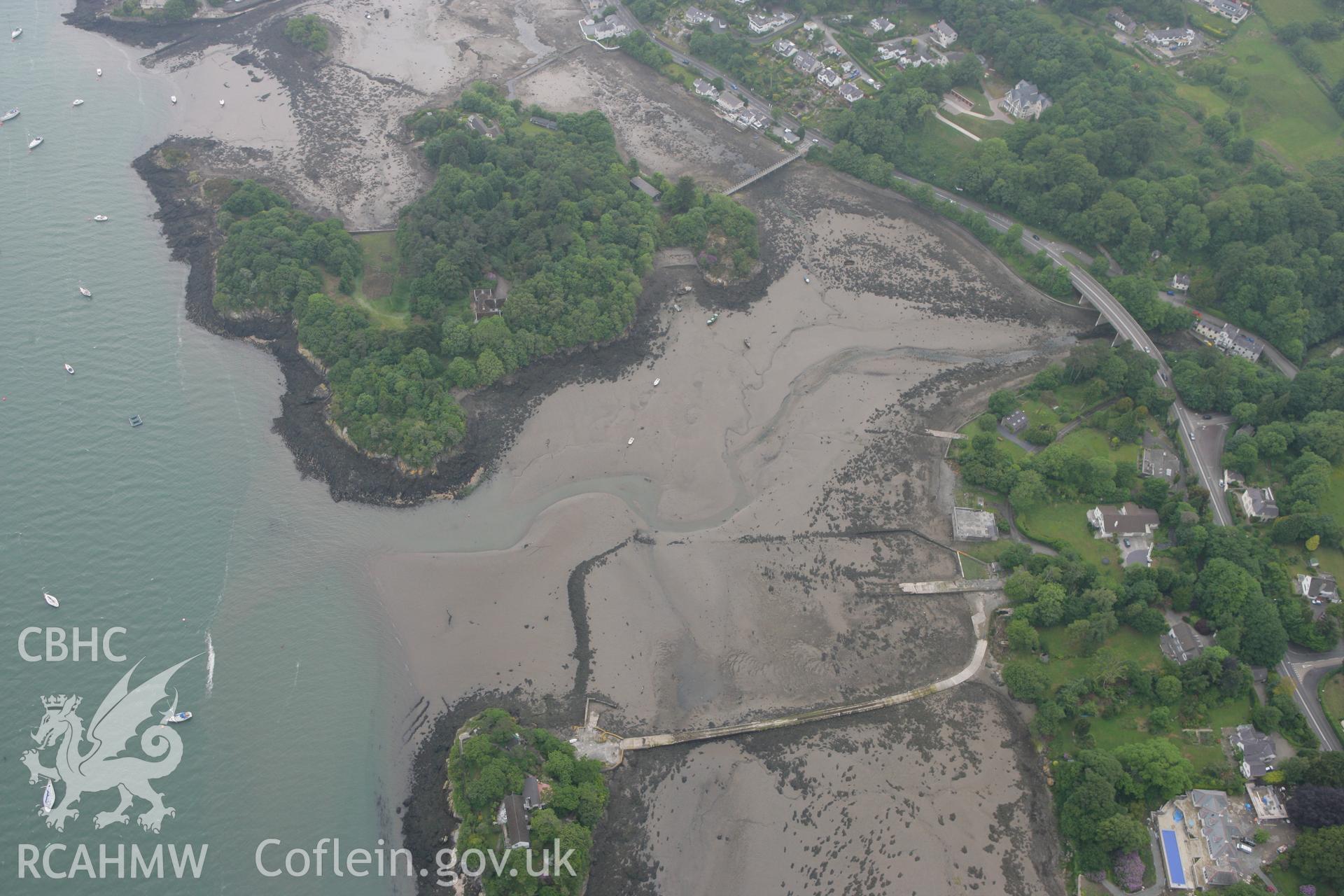 RCAHMW colour oblique photograph of Ynys y Castell, landscape at low tide. Taken by Toby Driver on 10/06/2010.
