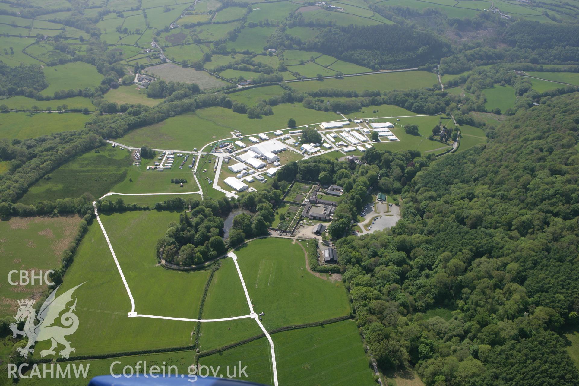 RCAHMW colour oblique photograph of Urdd Eisteddfod, Llanerchaeron, 5 days before opening. Taken by Toby Driver on 25/05/2010.