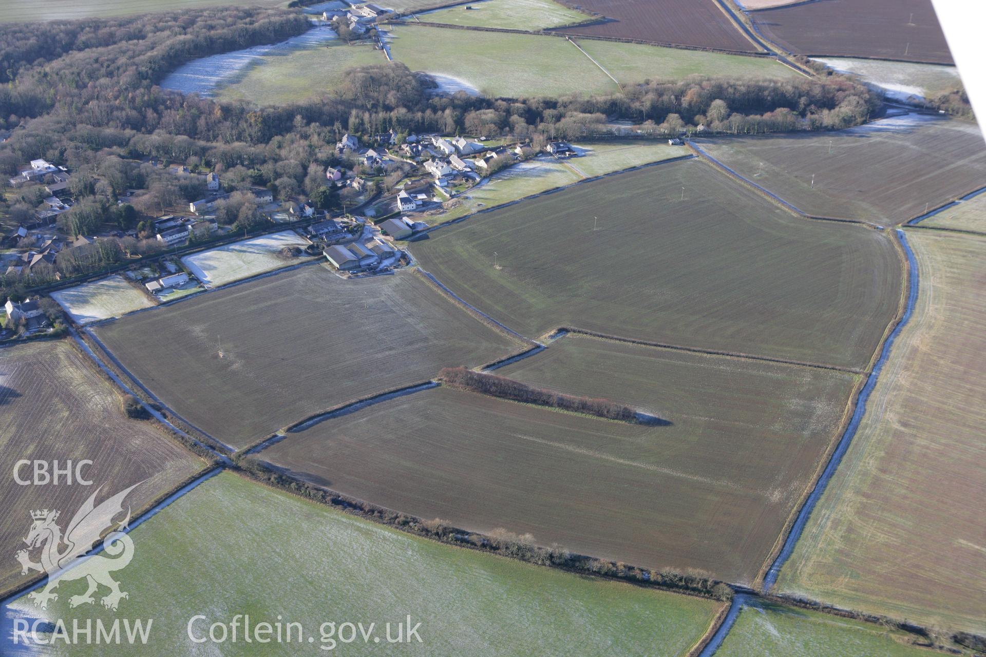 RCAHMW colour oblique photograph of St Donat's deserted village (site of). Taken by Toby Driver on 08/12/2010.