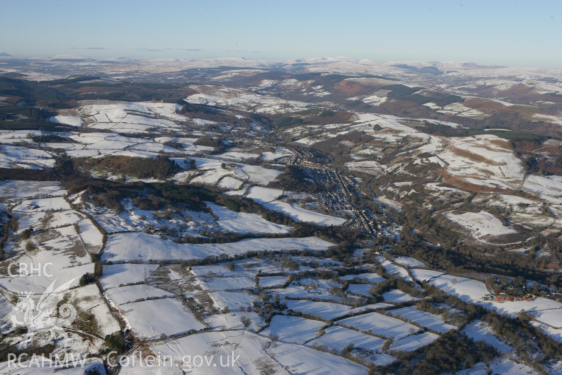 RCAHMW colour oblique photograph of Ynysybwl, landscape from the south. Taken by Toby Driver on 08/12/2010.